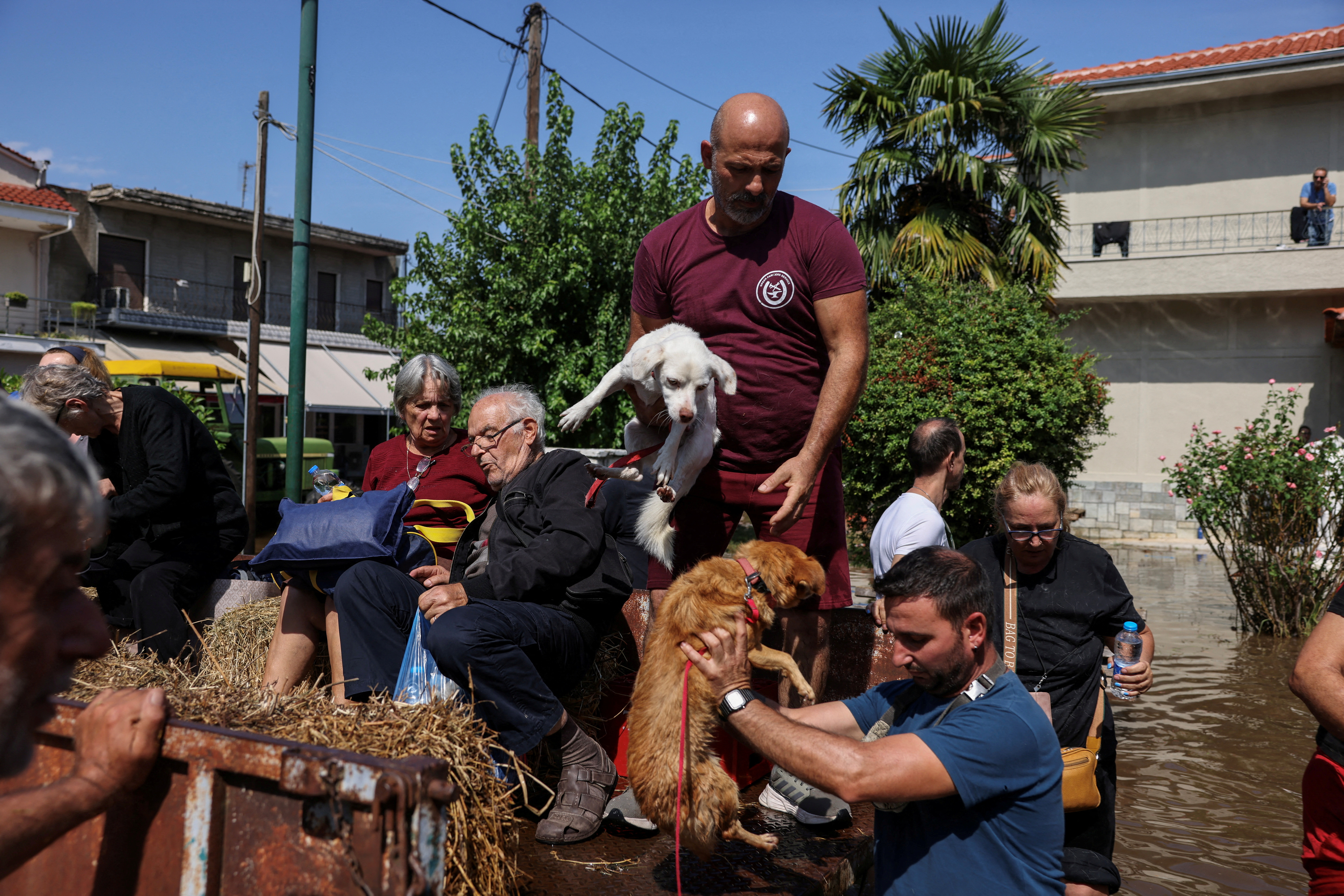 People are evacuated from the flooded village, in the aftermath of Storm Daniel in central Greece