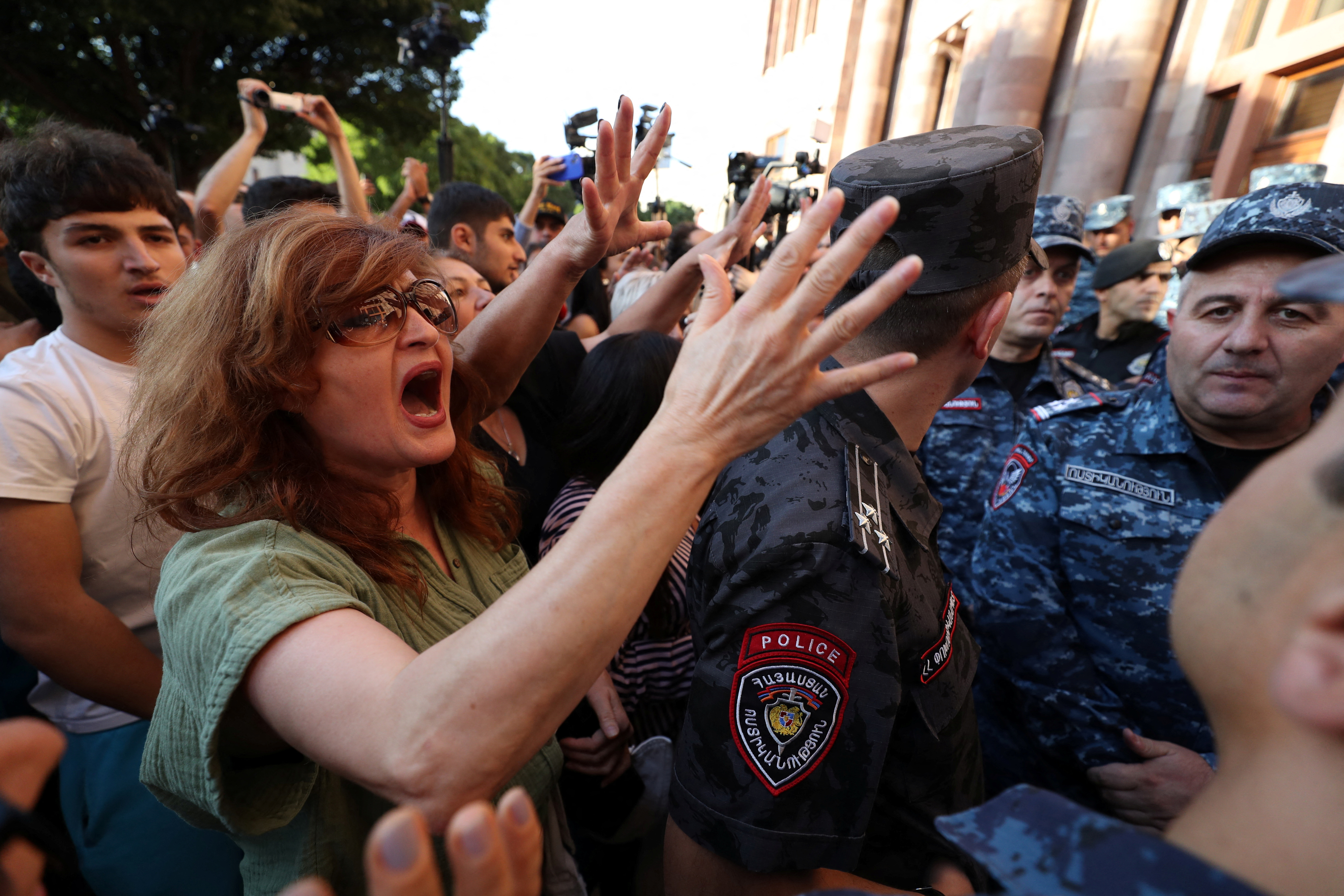 Protesters gather near the government building, after Azerbaijan launched a military operation in the region of Nagorno-Karabakh, in Yerevan, Armenia