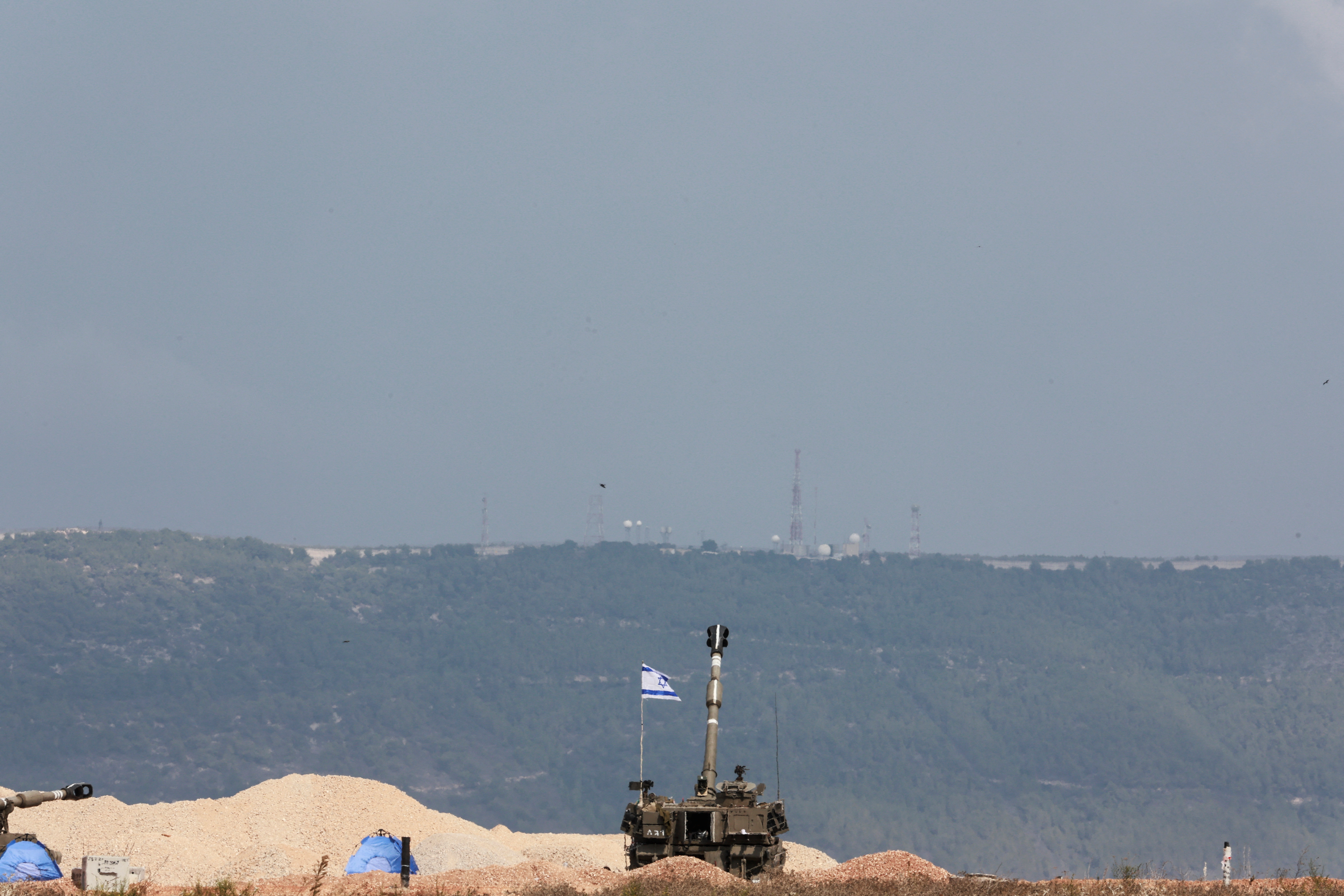 An Israeli tank is positioned near Israel’s border with Lebanon