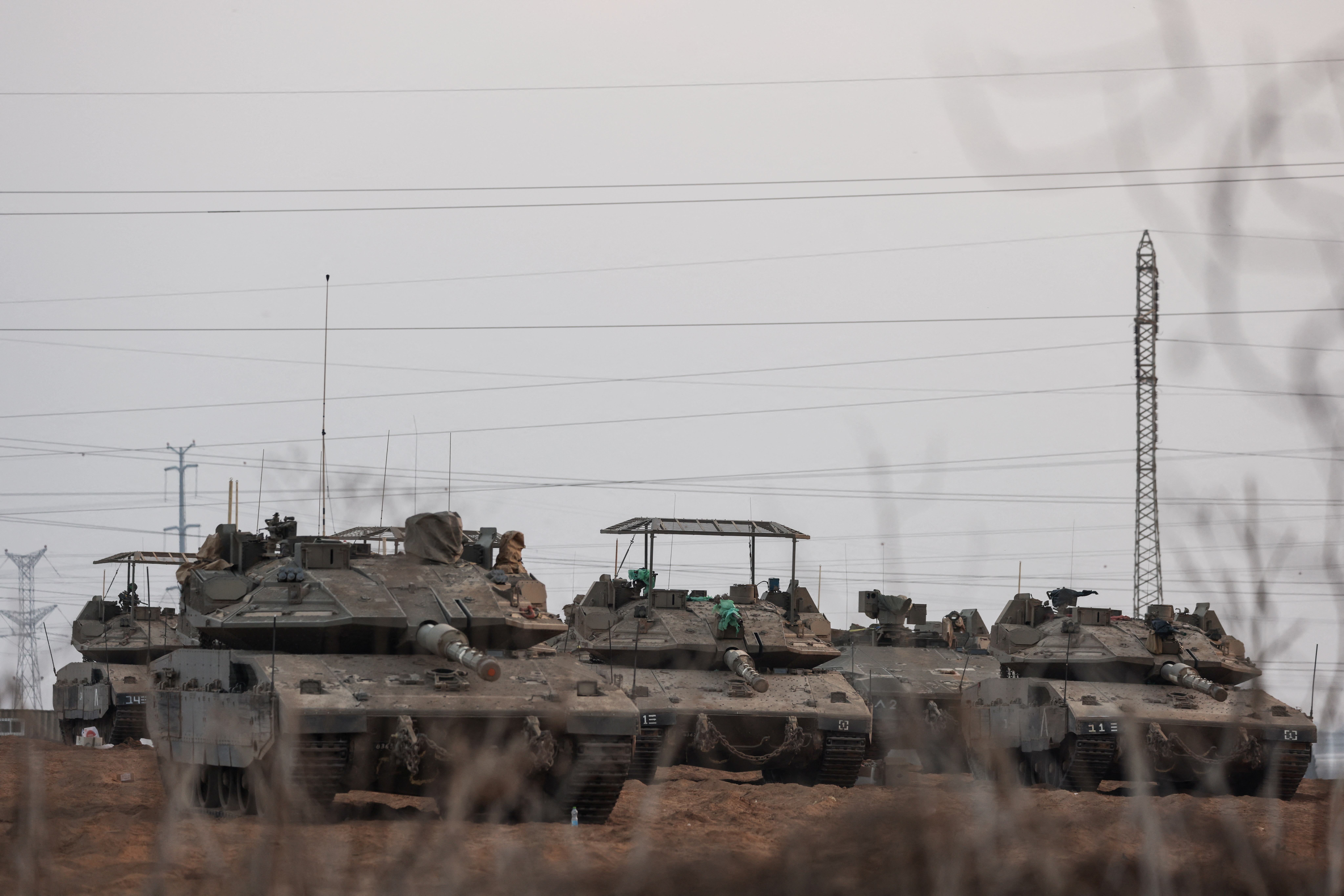 Israeli tanks are positioned near Israel's border with the Gaza Strip, in southern Israel, October 22, 2023