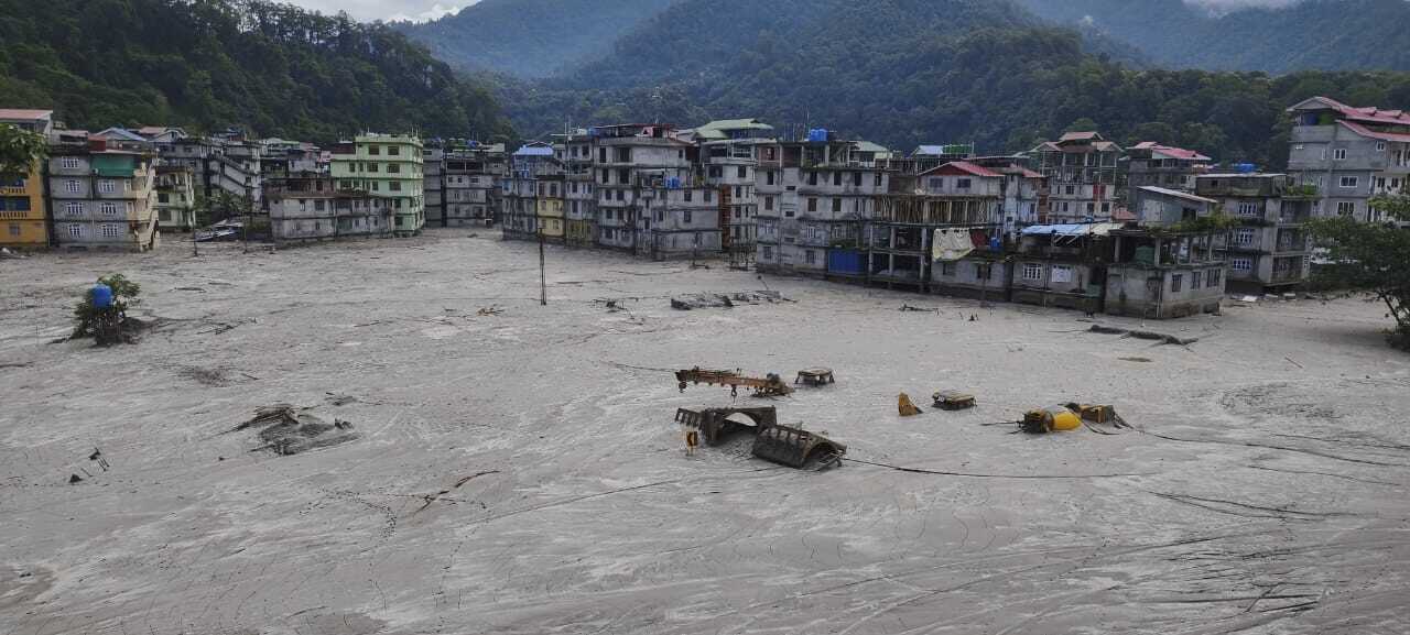Buildings are inundated after flash floods triggered by sudden heavy rainfall swamped Rangpo town in Sikkim, India, Friday, October 6, 2023