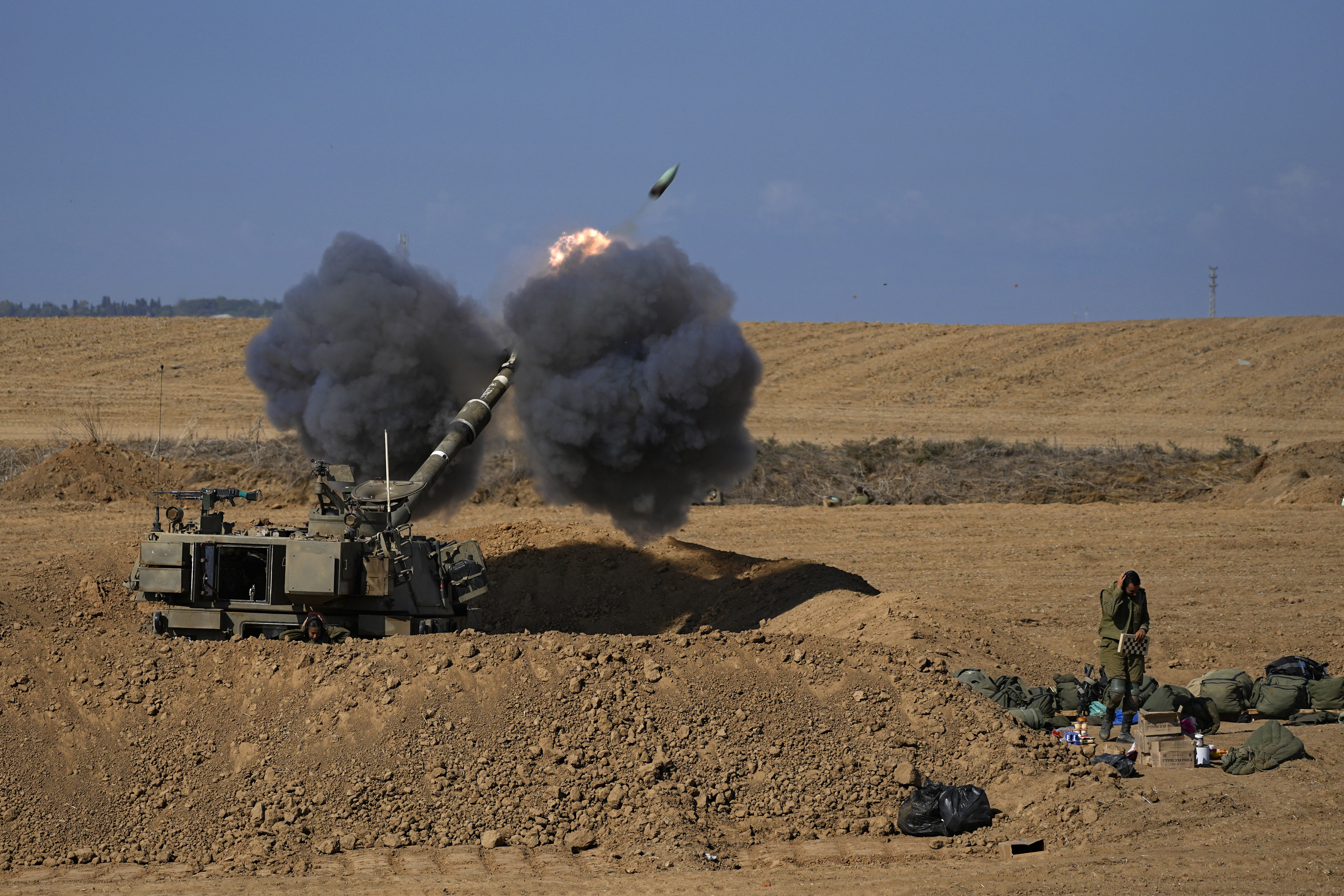 An Israeli mobile artillery unit fired a shell from southern Israel towards the Gaza Strip, in a position near the Israel-Gaza border, Israel, October 15, 2023