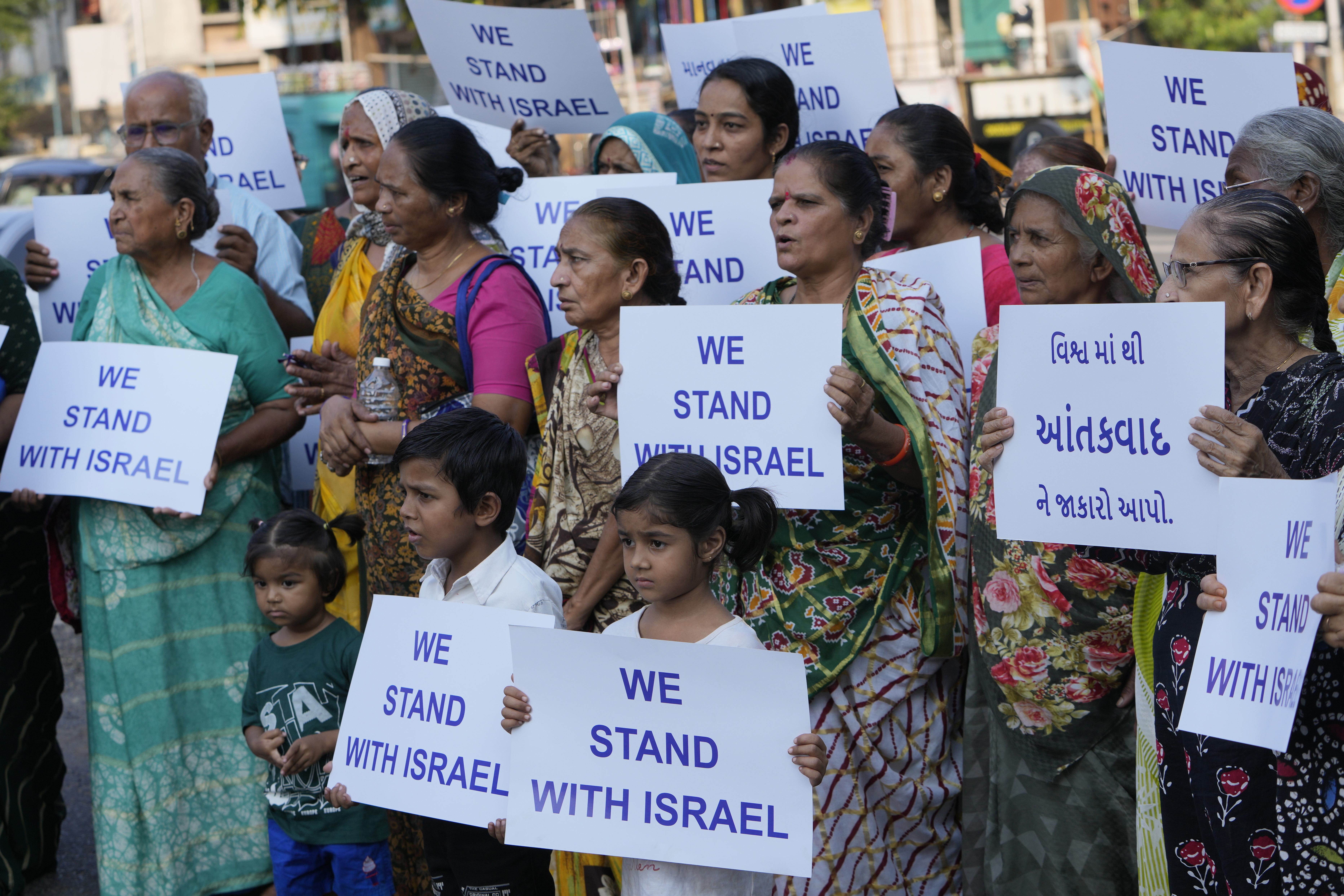 People hold placards in solidarity with Israel in Ahmedabad, Gujarat