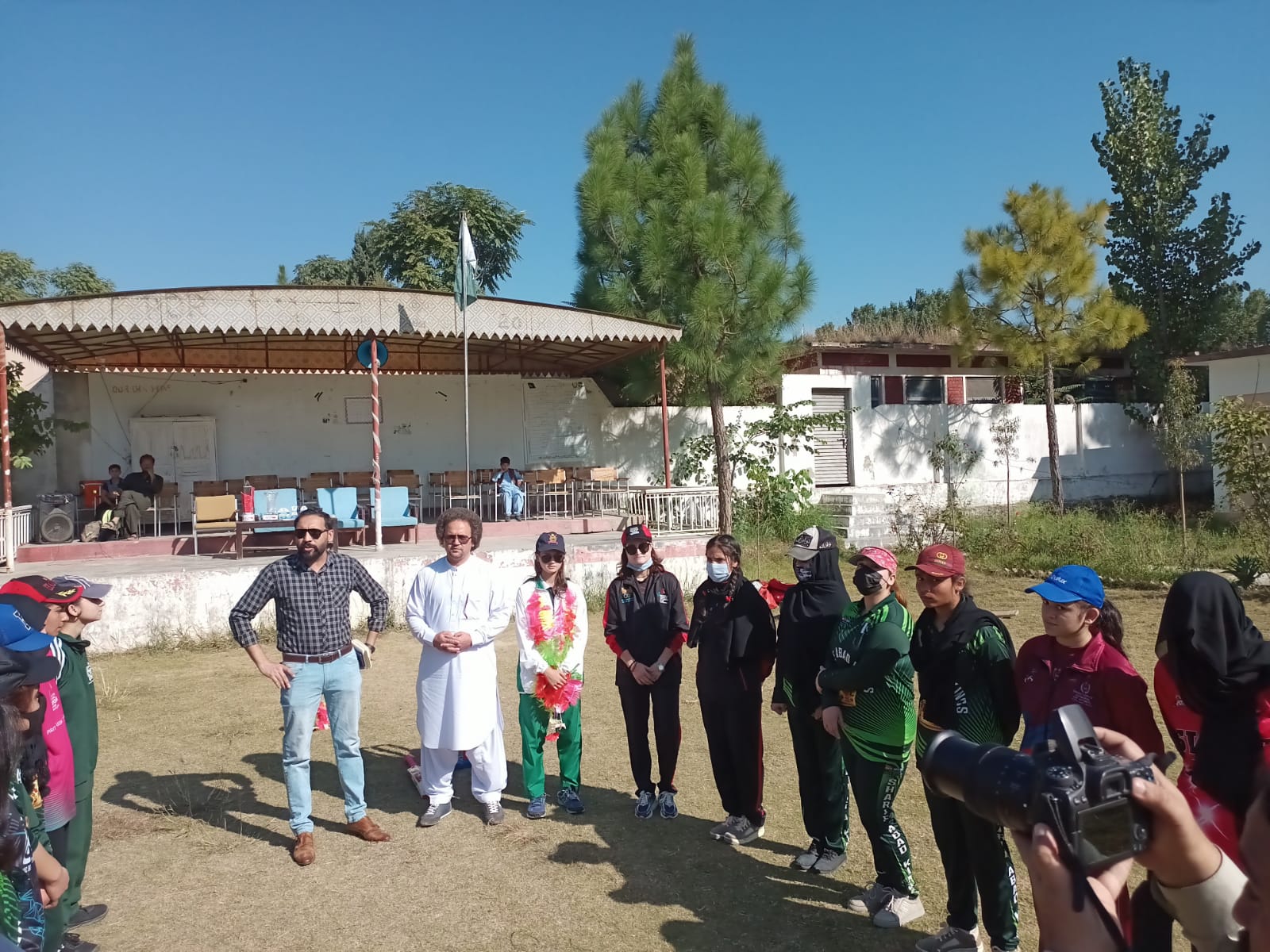 The girls’ cricket team gathers on the grounds of the Government Girls Higher Secondary School Kabal prior to the match [Photo courtesy of Ayaz Naik]