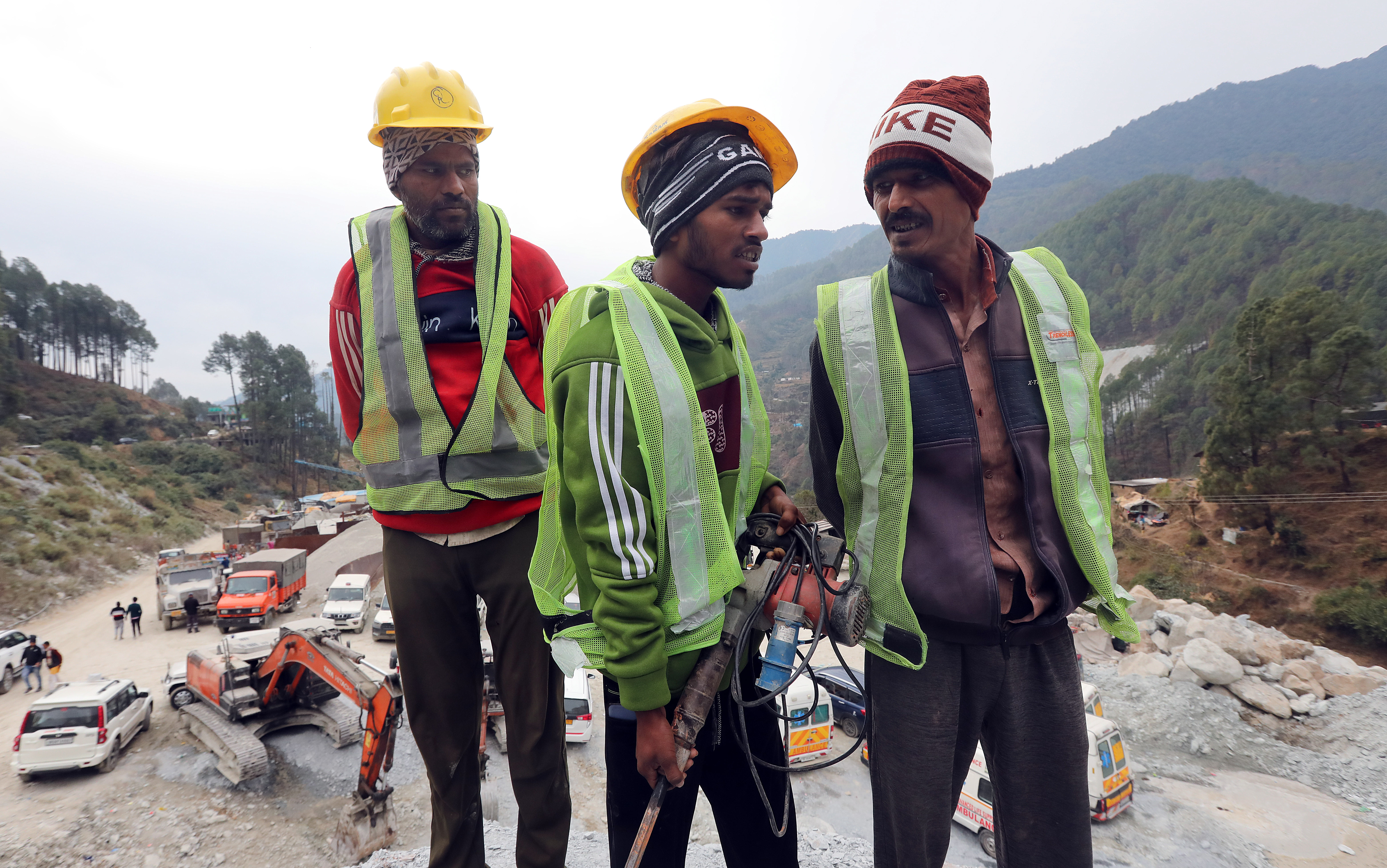A group of miners with a digging tool