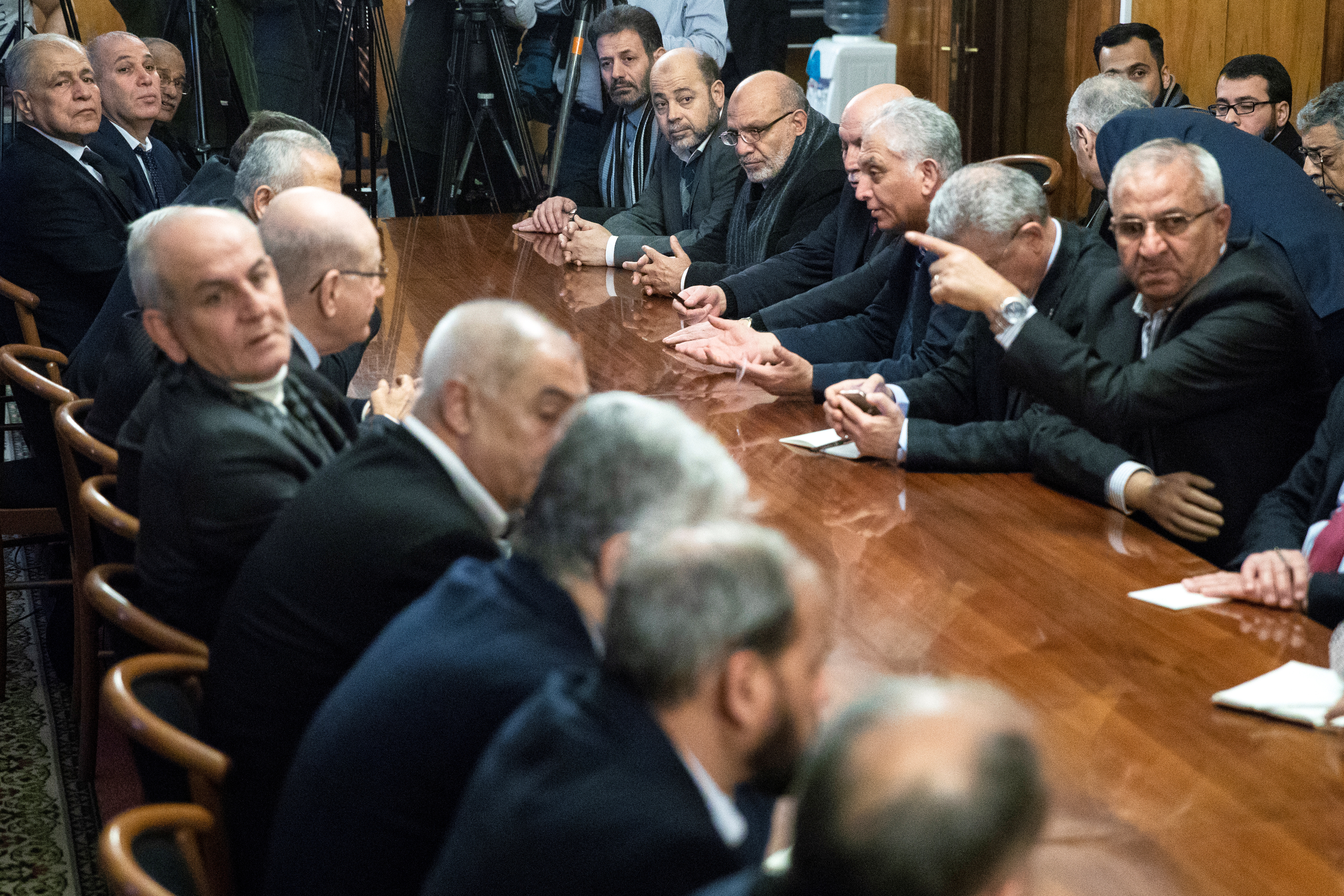 Fatah and Hamas officials wait for a meeting with Russian Foreign Minister Sergei Lavrov and representatives of Palestinian groups and movements as a part of an intra-Palestinian talks