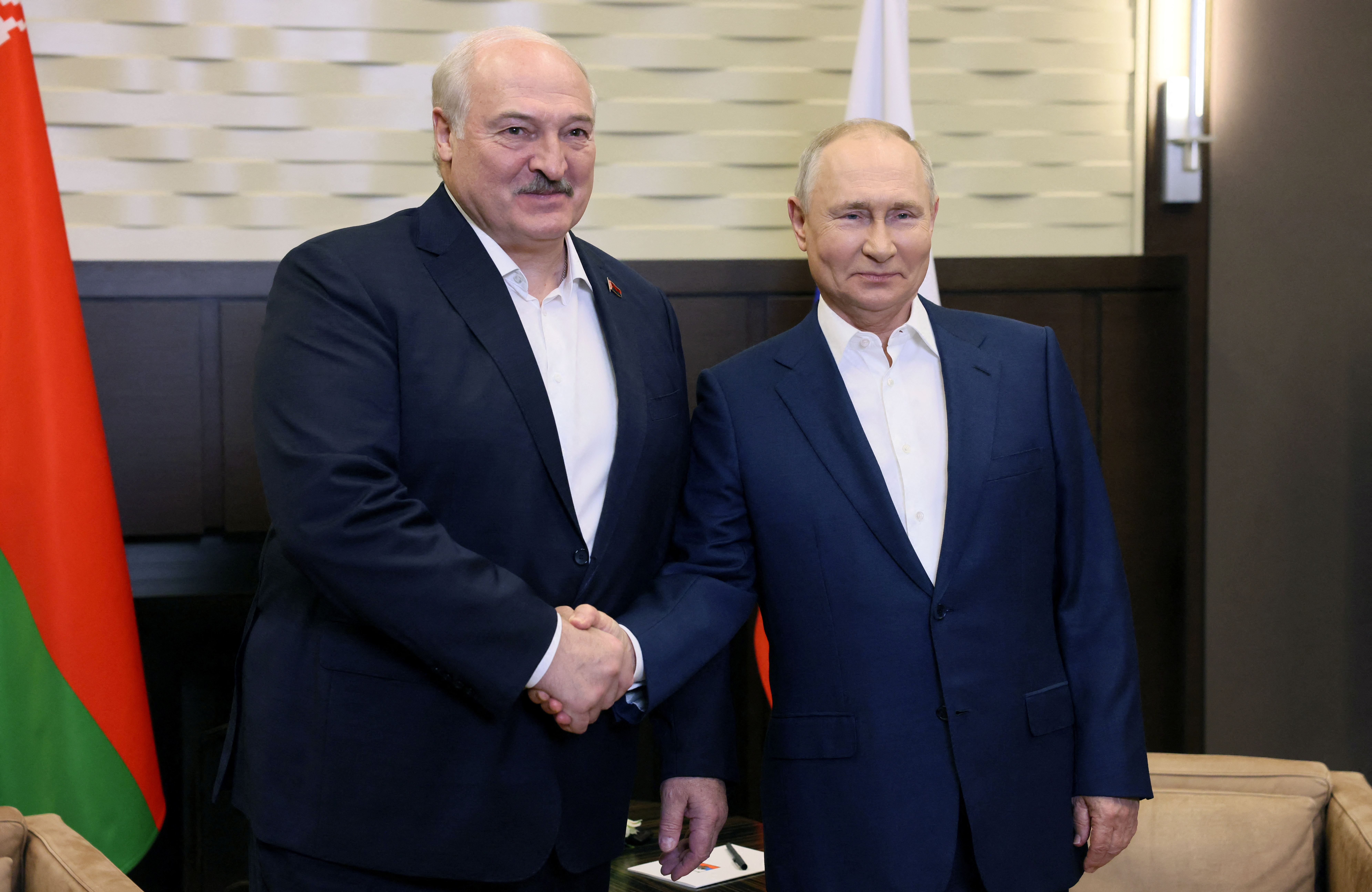 Lukashenko and Putin standing next to each other