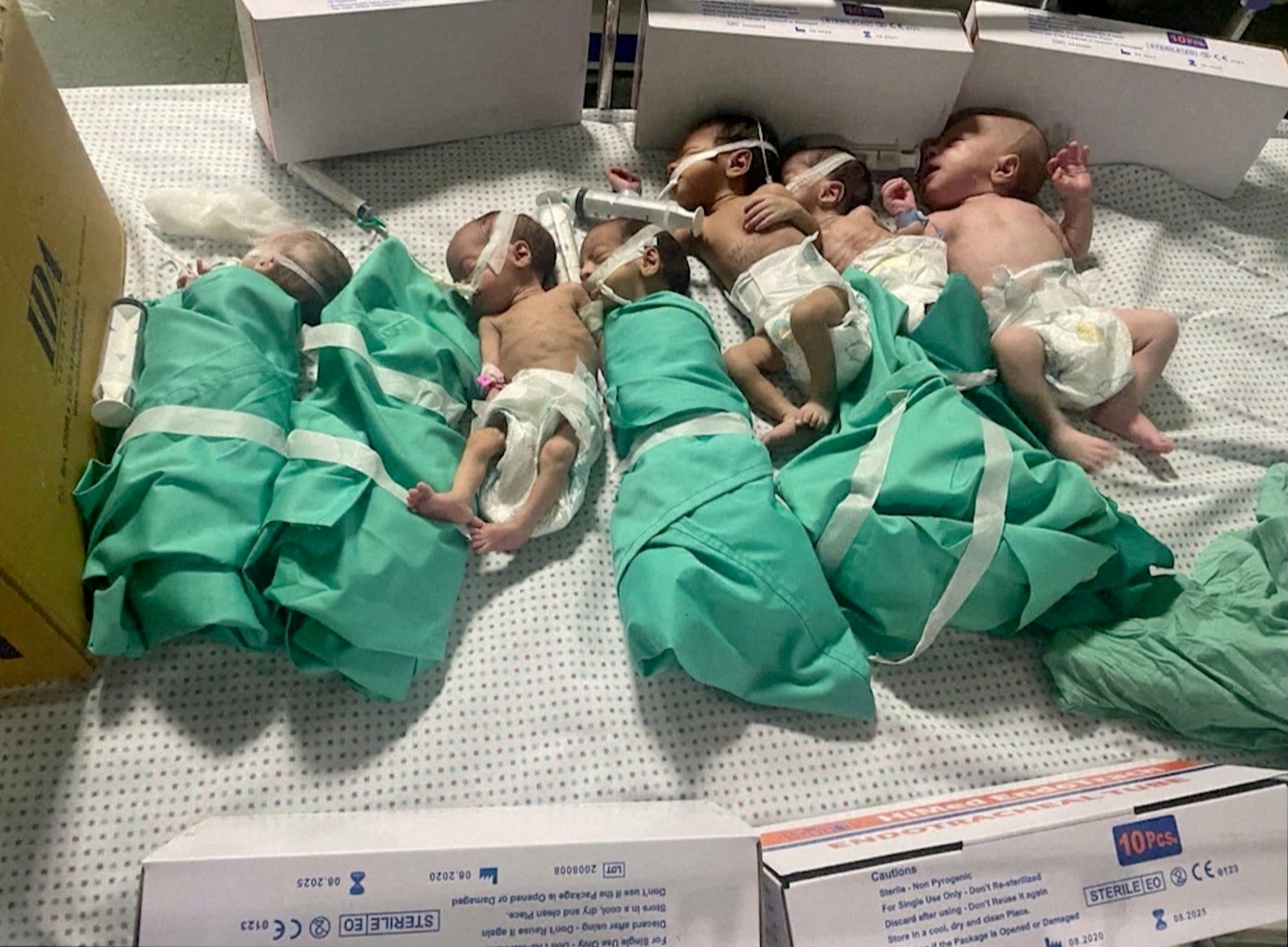 Newborns placed in a bed together after the incubators stopped running in al-Shifa Hospital, in Gaza City, November 12, 2023 [Reuters]