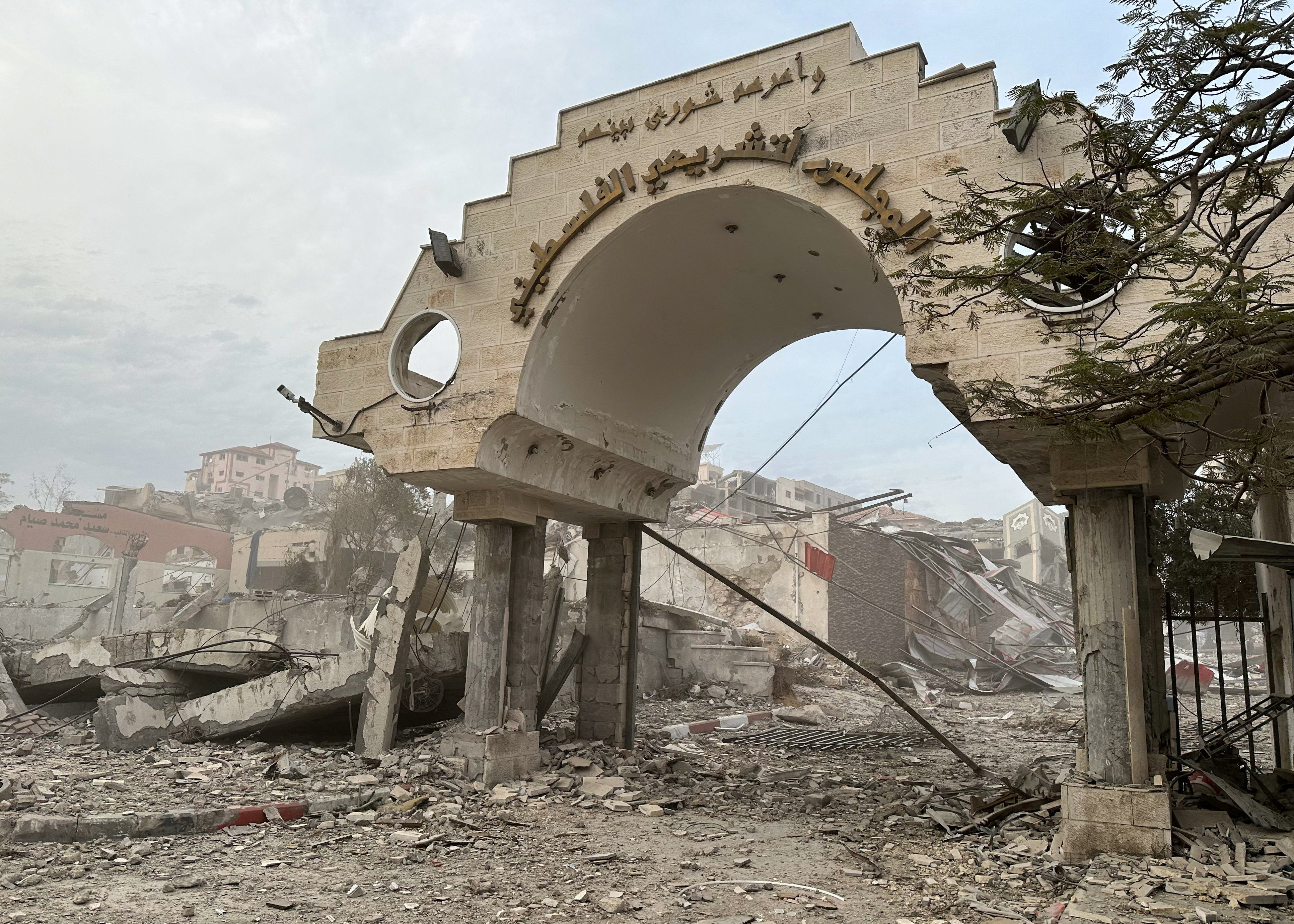 The remains of the headquarters of the Palestinian parliament, also known as the Legislative Council, which was destroyed by Israeli forces during Israel's ground operation, are seen amid a temporary truce between Hamas and Israel, in Gaza City November 25, 2023. REUTERS/Abed Sabah