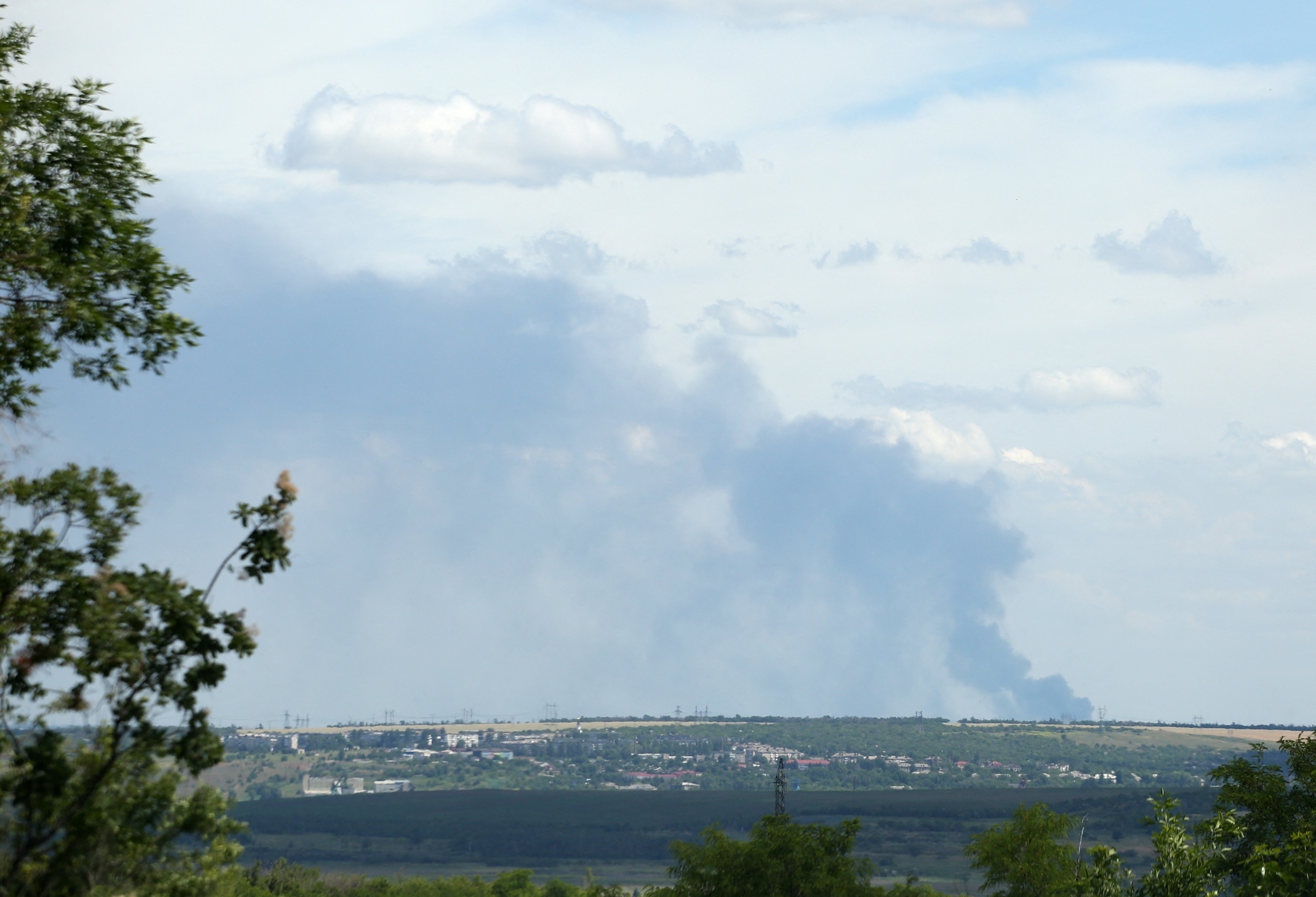 A picture shows smoke during fighting in Luhansk region, eastern Ukraine, on June 24, 2022. (Photo by Anatolii Stepanov / AFP)