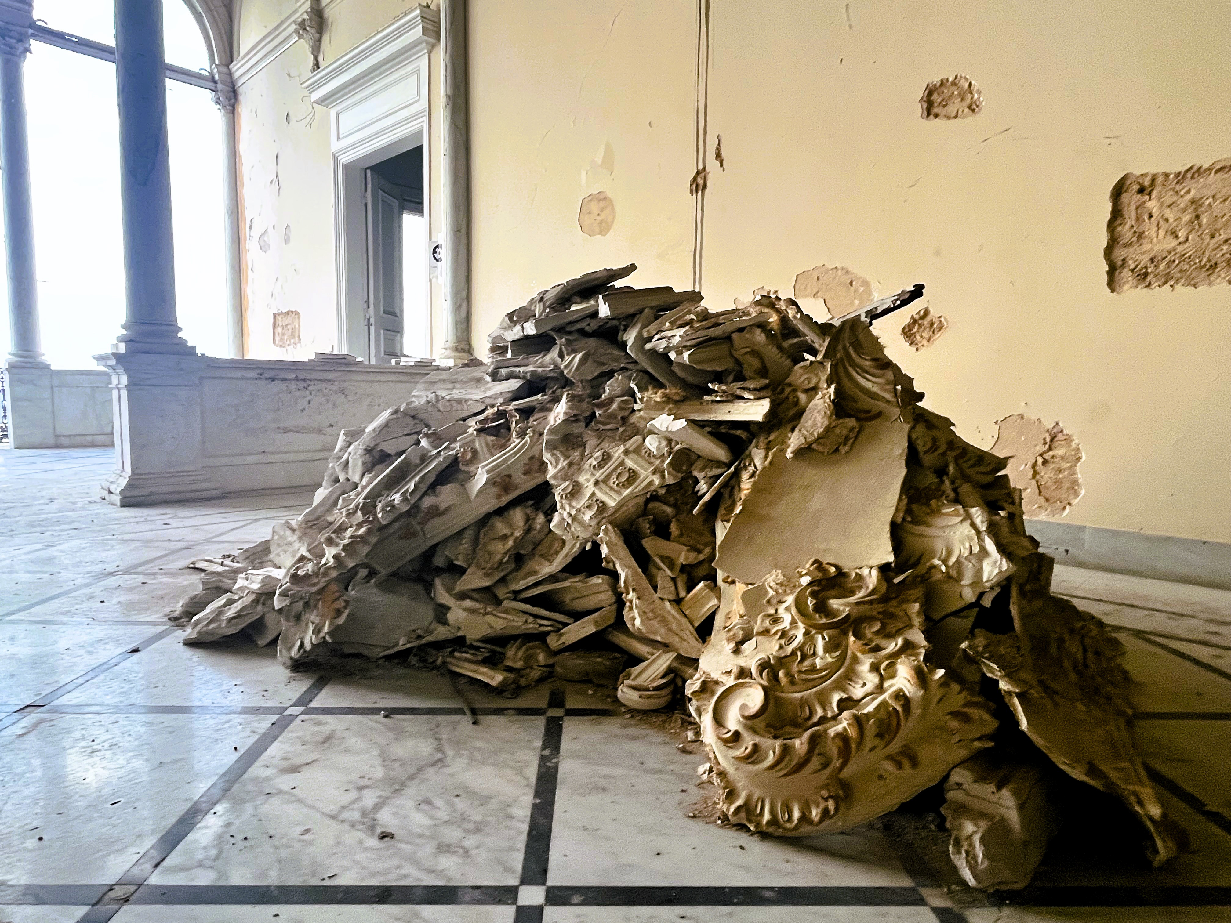 A pile of decorative stucco elements that fell during the blast, awaiting restoration
