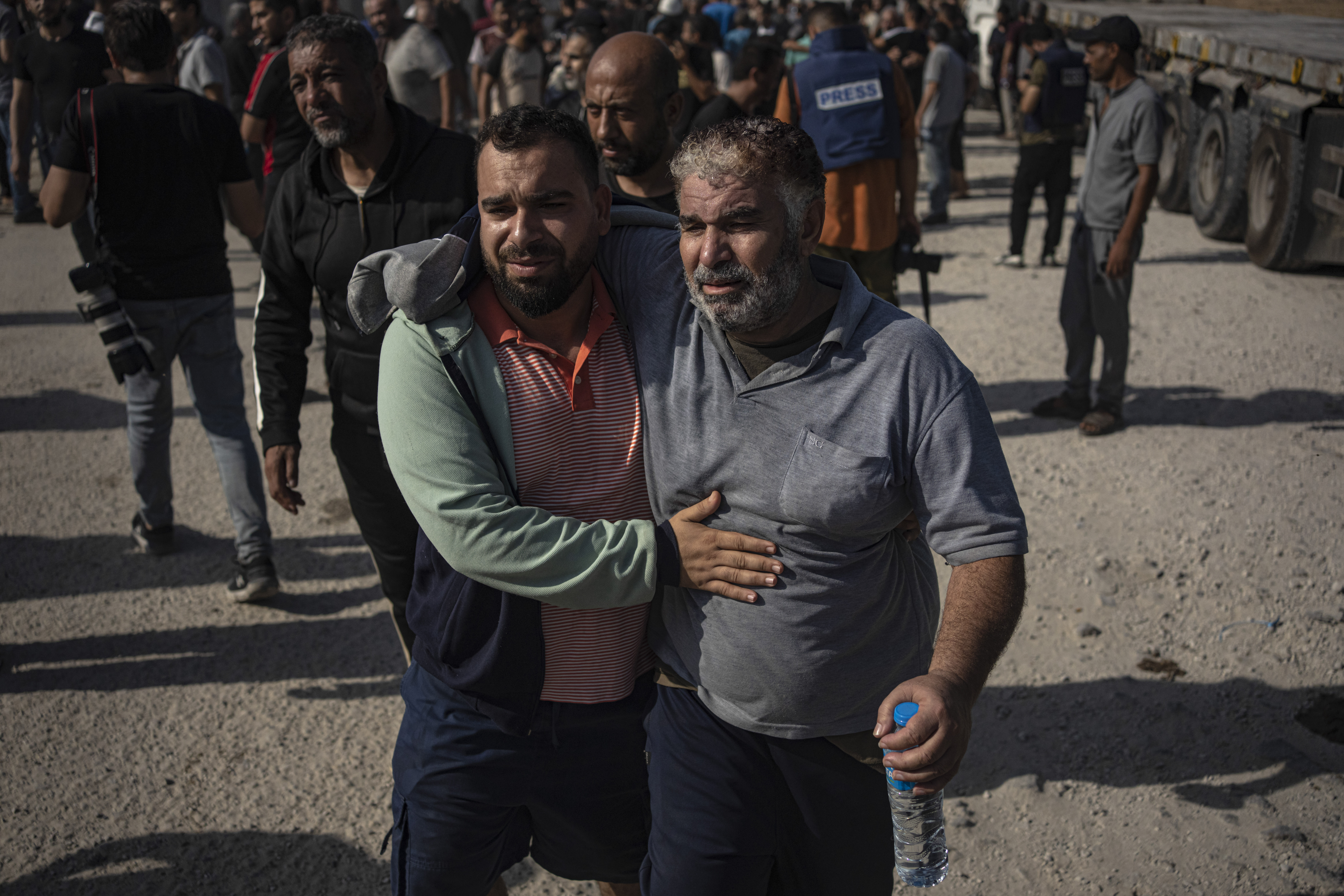 Palestinian workers stranded in Israel arrive in the Gaza Strip through the Kerem Shalom crossing on November 3, 2023