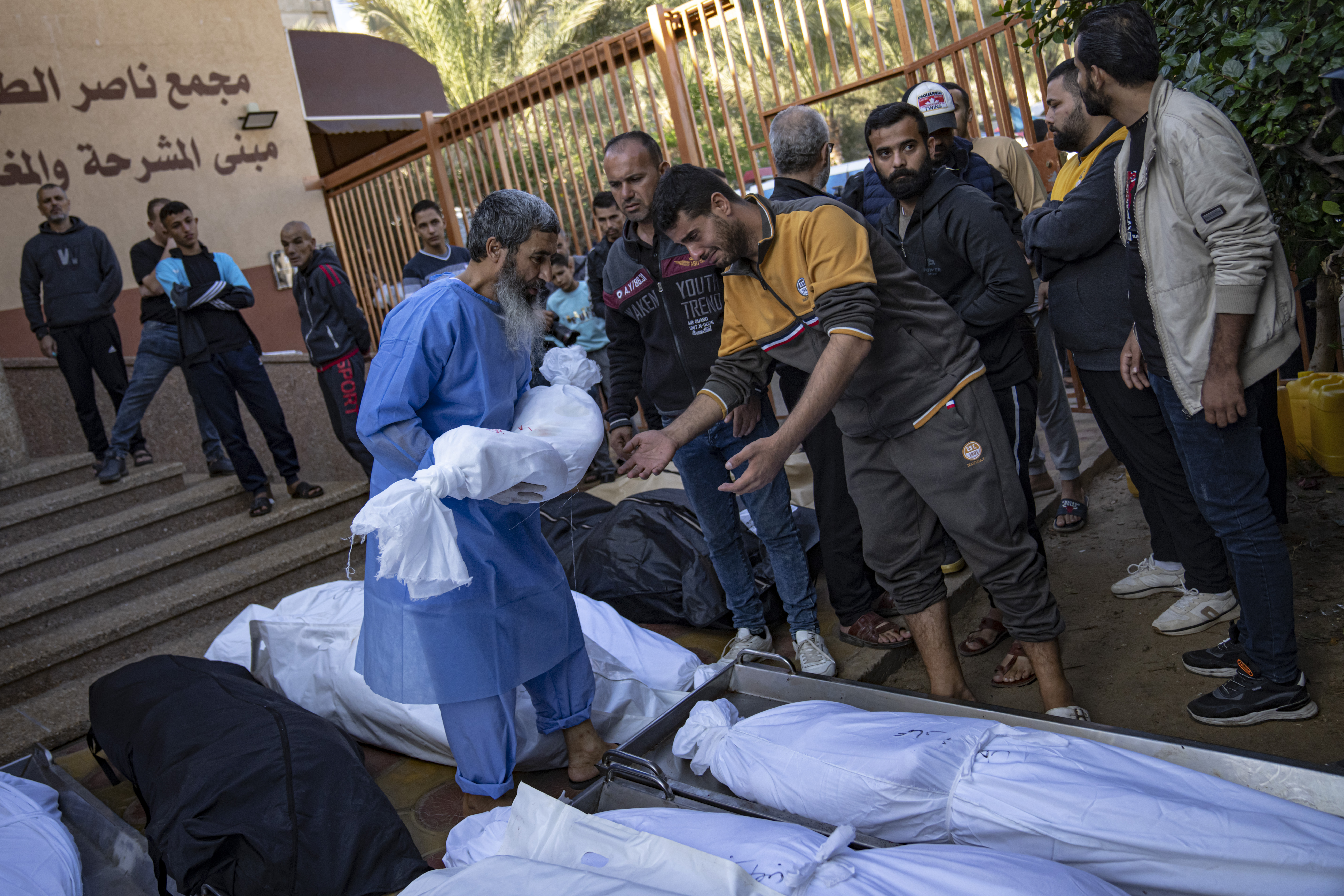 Palestinians mourn their relatives killed in the Israeli bombardment of the Gaza Strip, in the hospital in Khan Younis.