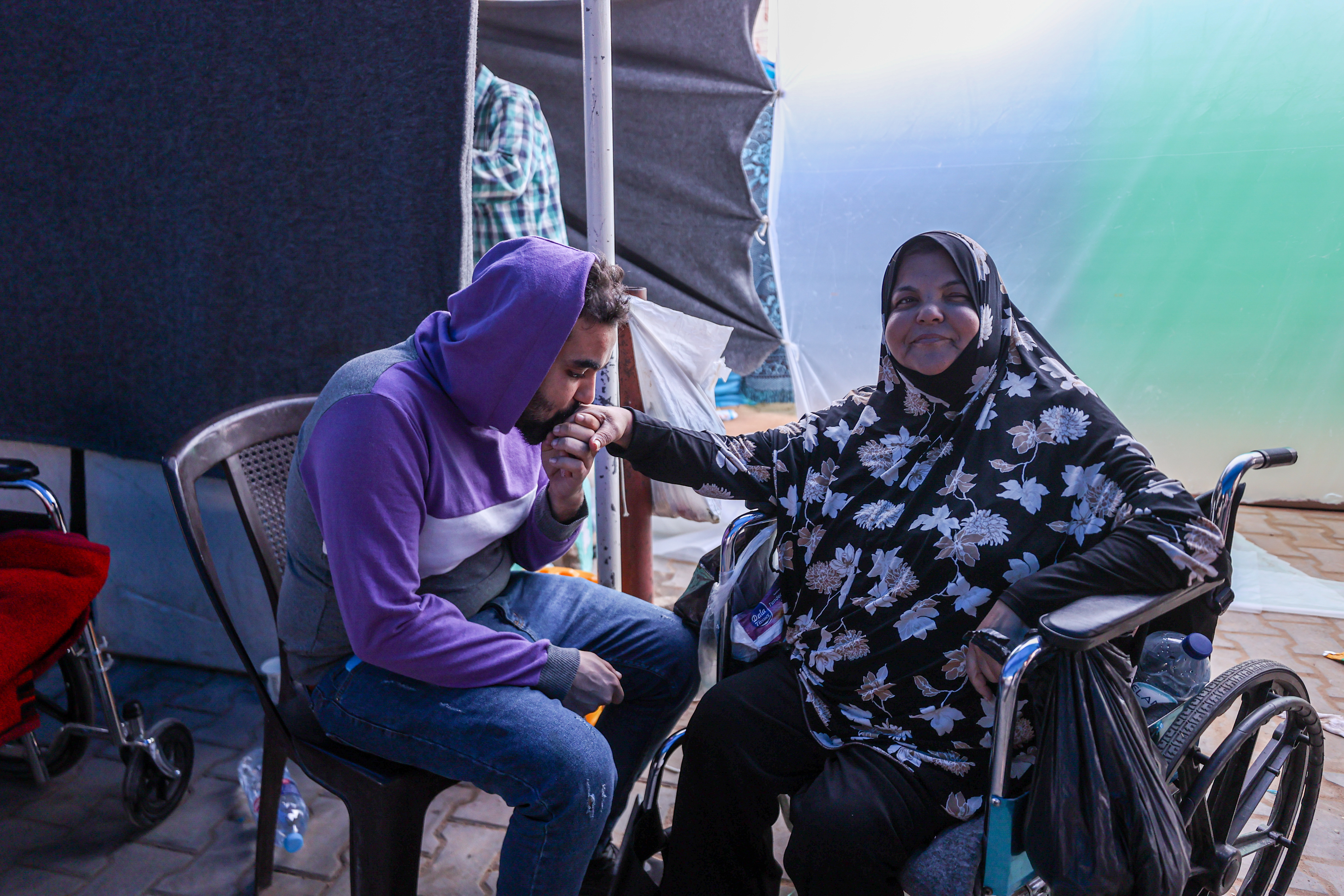 Jawdat had to work hard to convince his mother to flee her home for her own safety