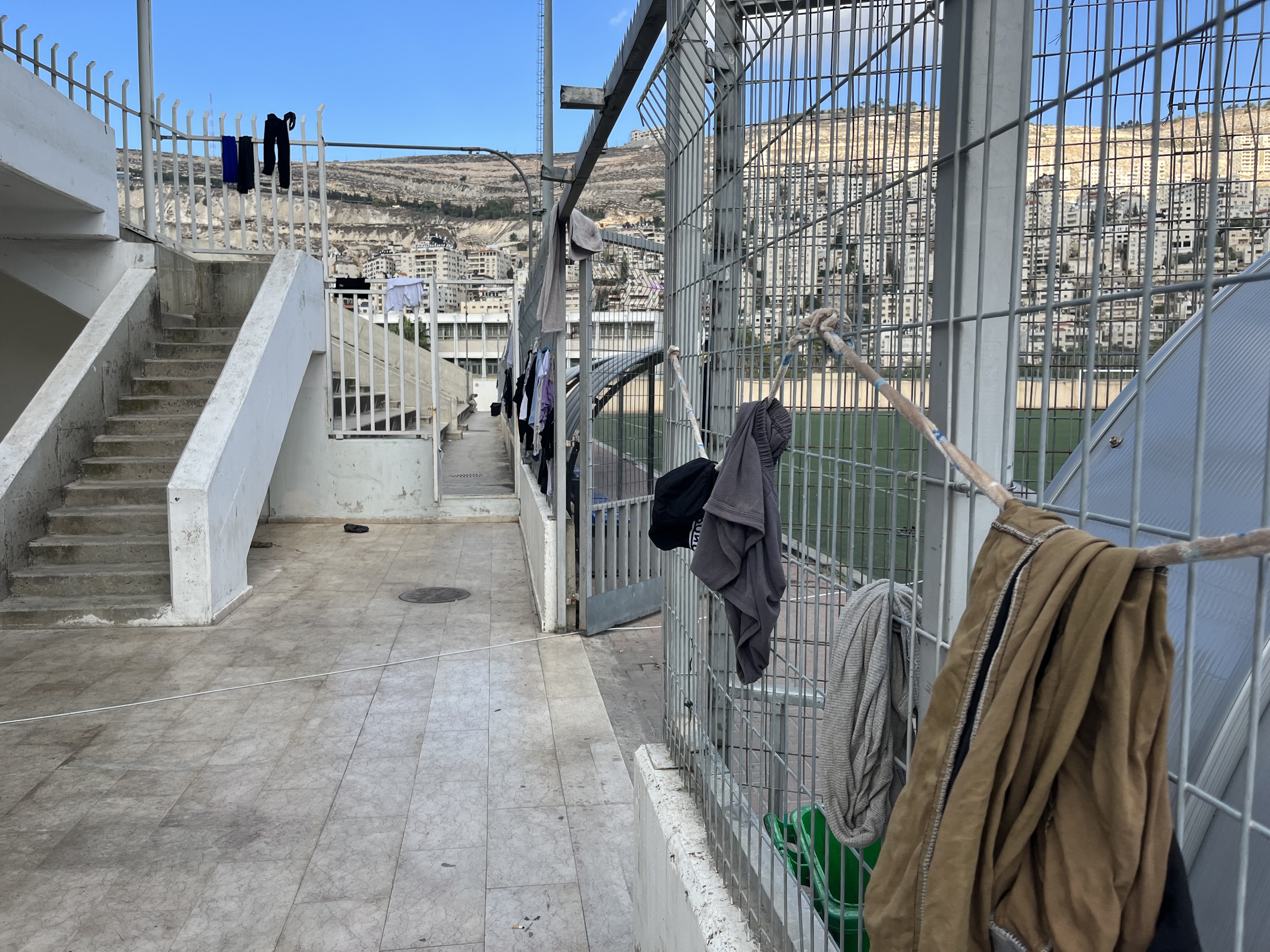 The camp at the Nablus Municipal Stadium, where residents of Gaza are stranded, unable to return home to their families [Al Jazeera]