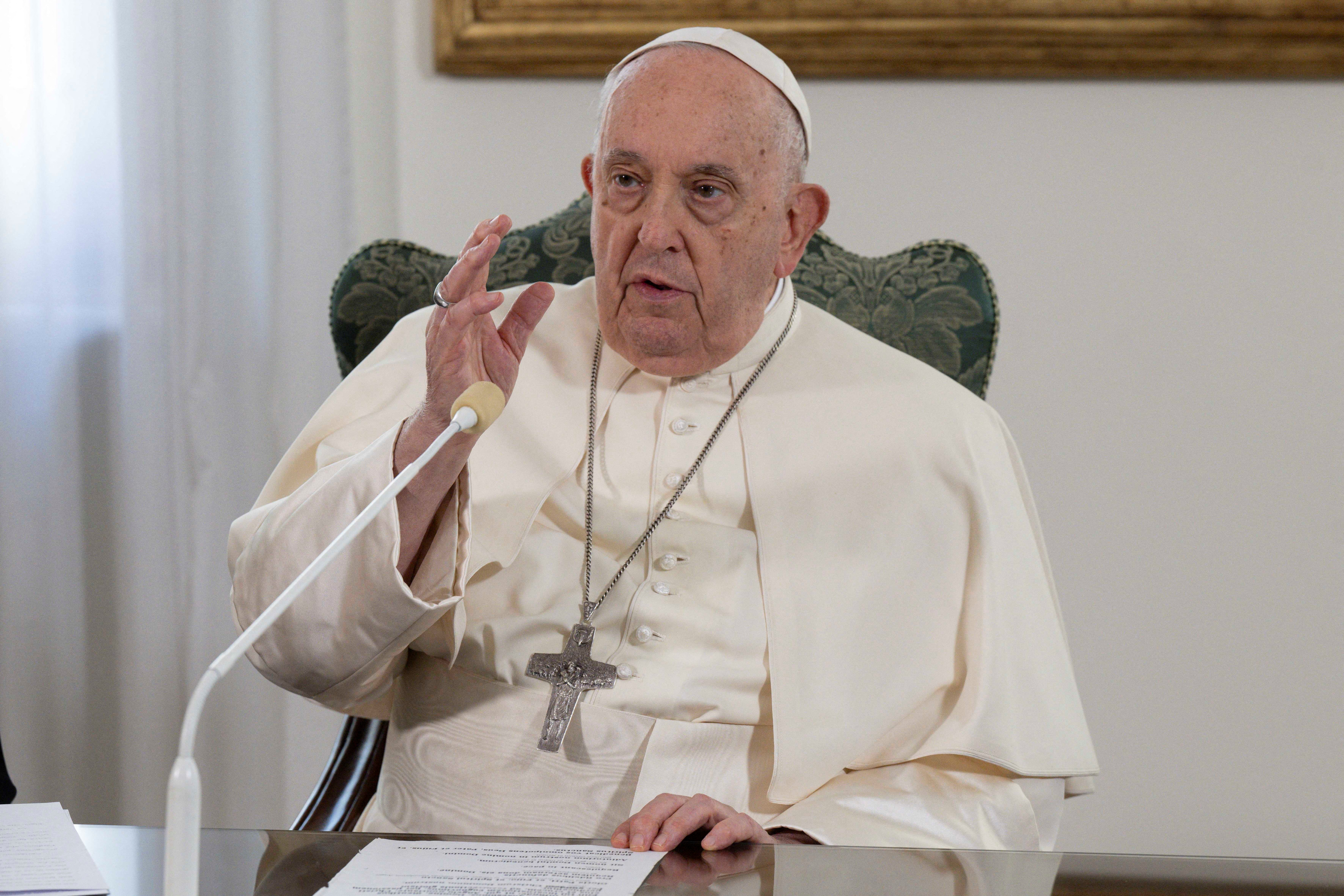 Pope Francis recites the Angelus prayer at the Vatican, December 3