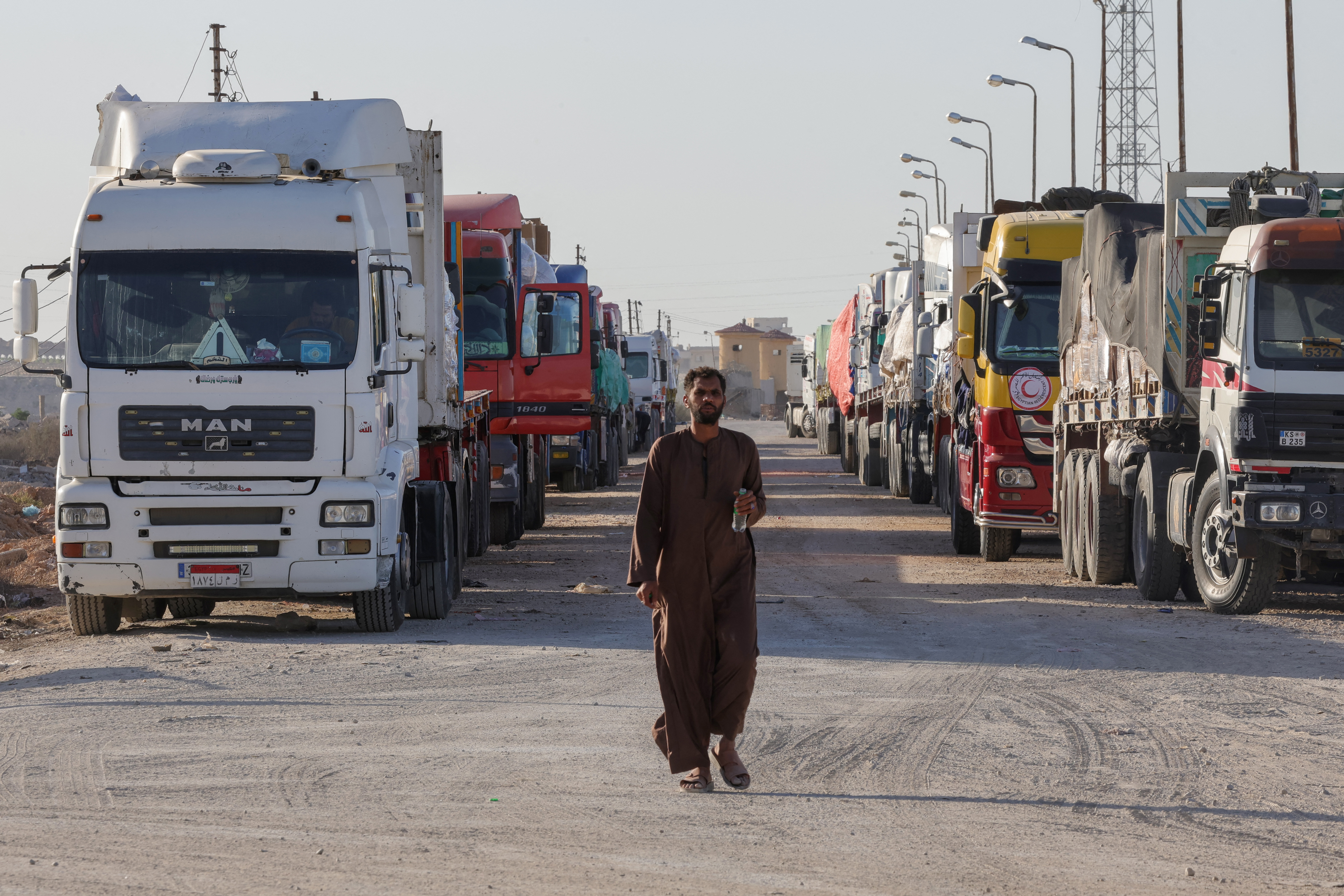 Egypt has been affected by the conflict in Gaza in more ways than one. Here, trucks laden with humanitarian aid wait on the Egyptian side of the Rafah crossing with Gaza on December 11, 2023