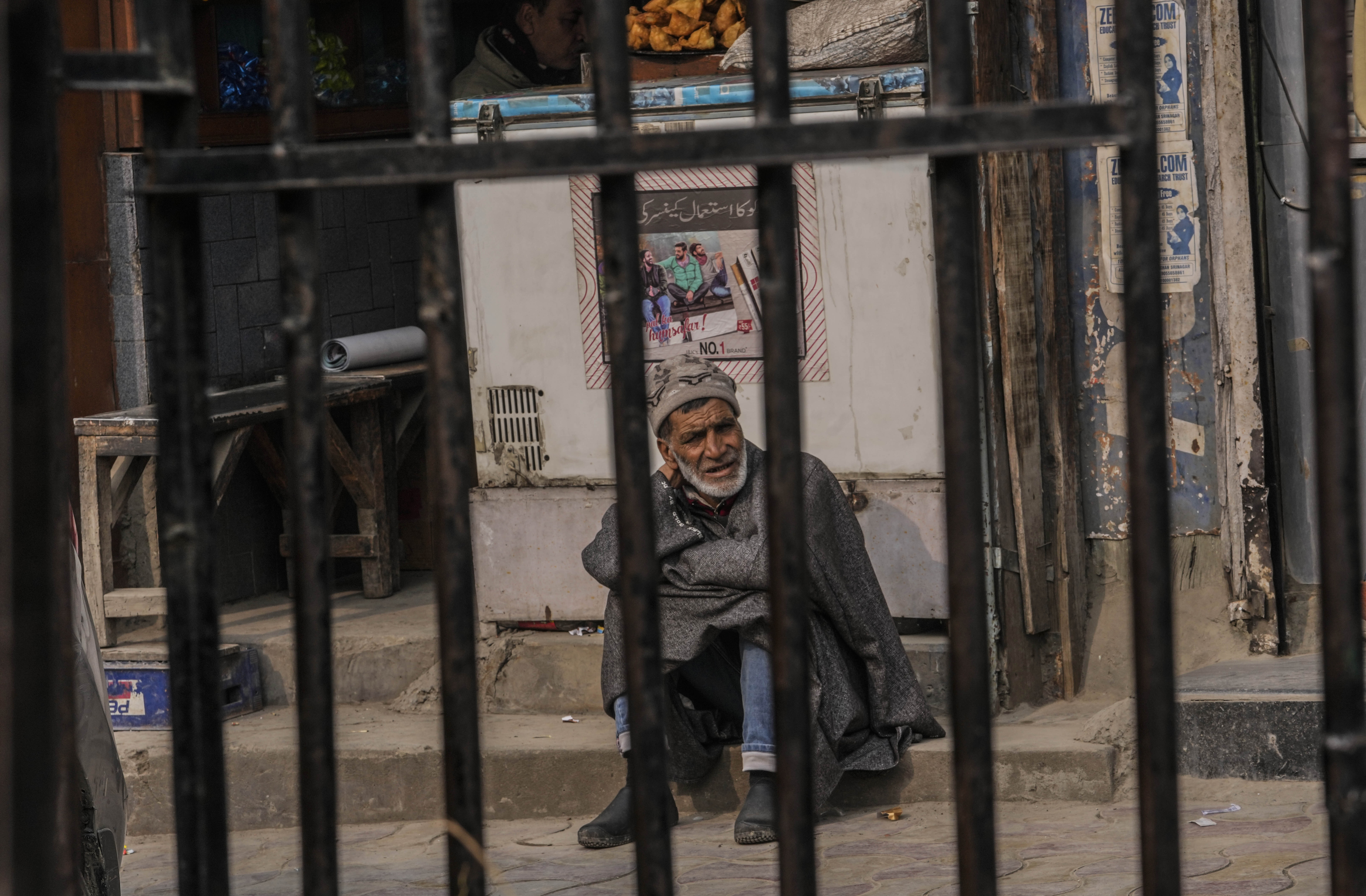 A Kashmiri man at a market in Srinagar on Monday when the top court verdict came