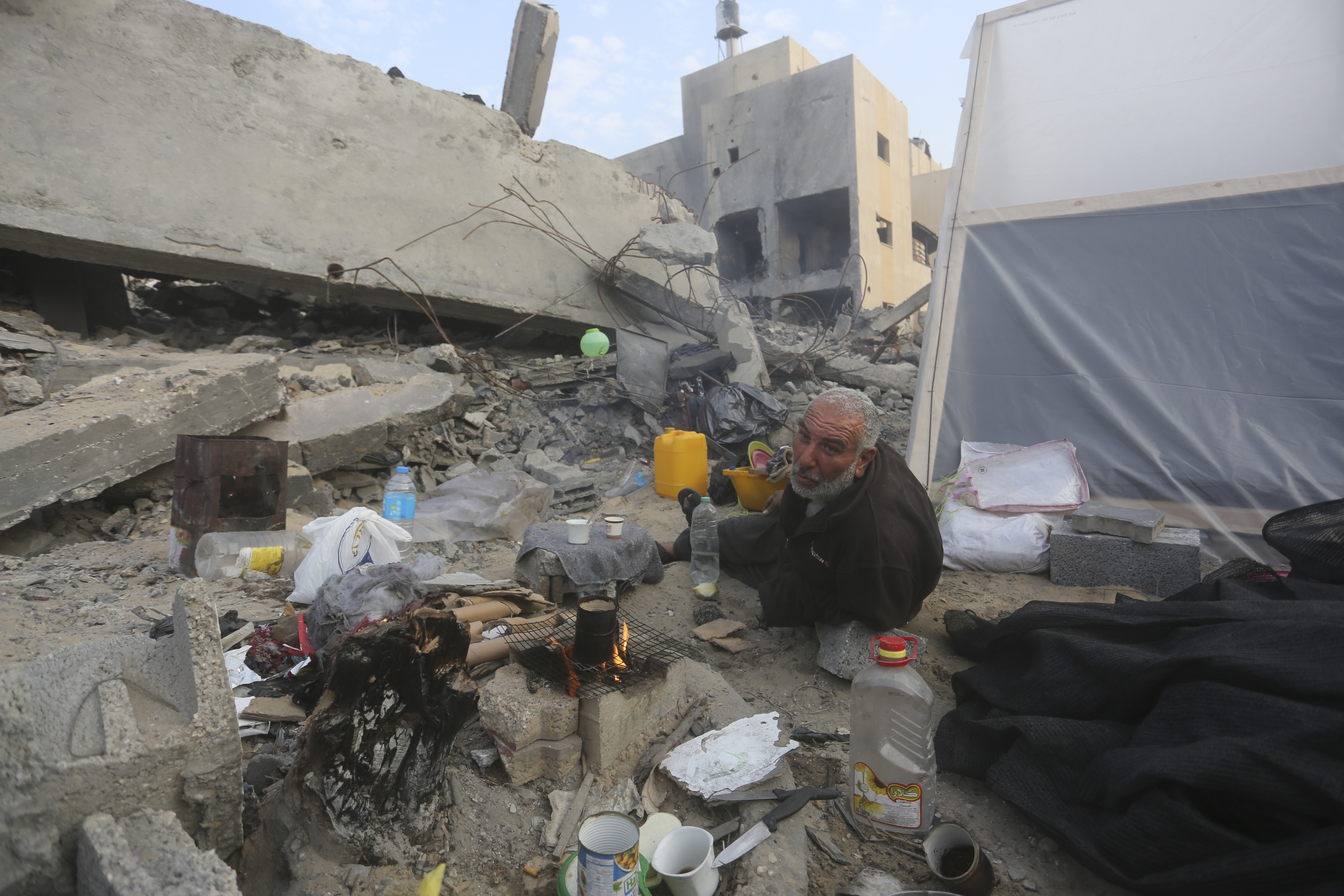Palestinians fleeing the Israeli bombardment of the Gaza Strip arrive in Rafah Wednesday.
