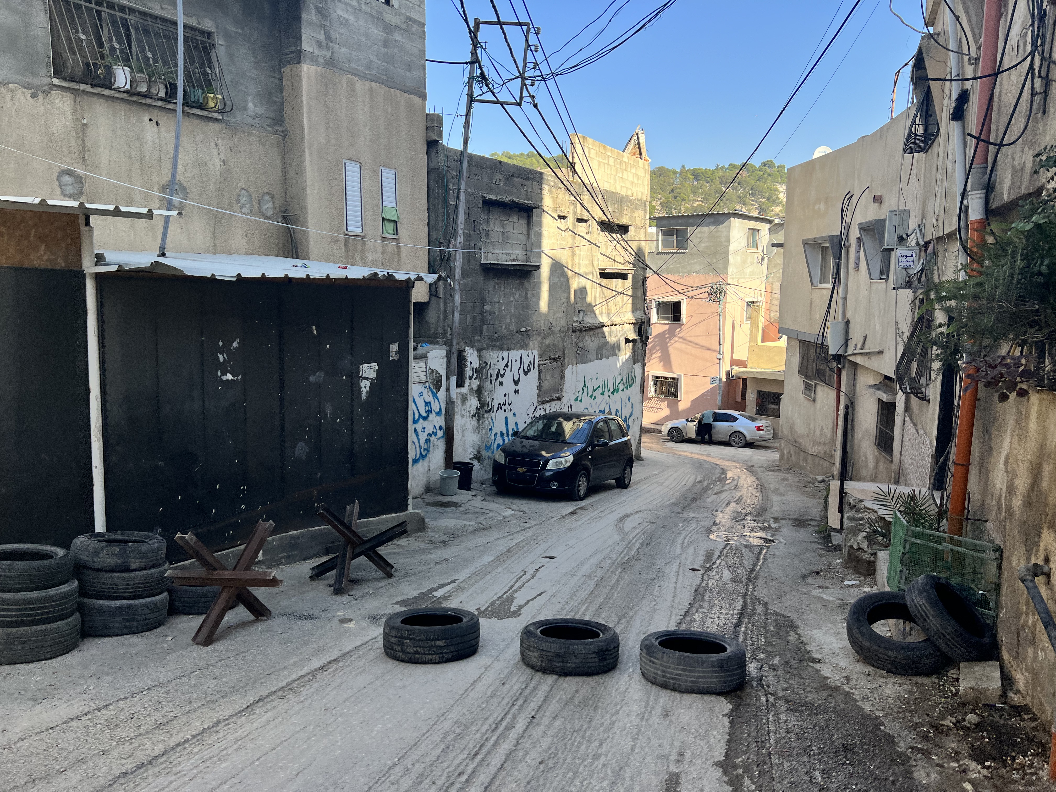 Residents of the Nur Shams camp place obstacles at the entrances to the camp to block the Israeli army during raids, a practice used by fighters in other areas