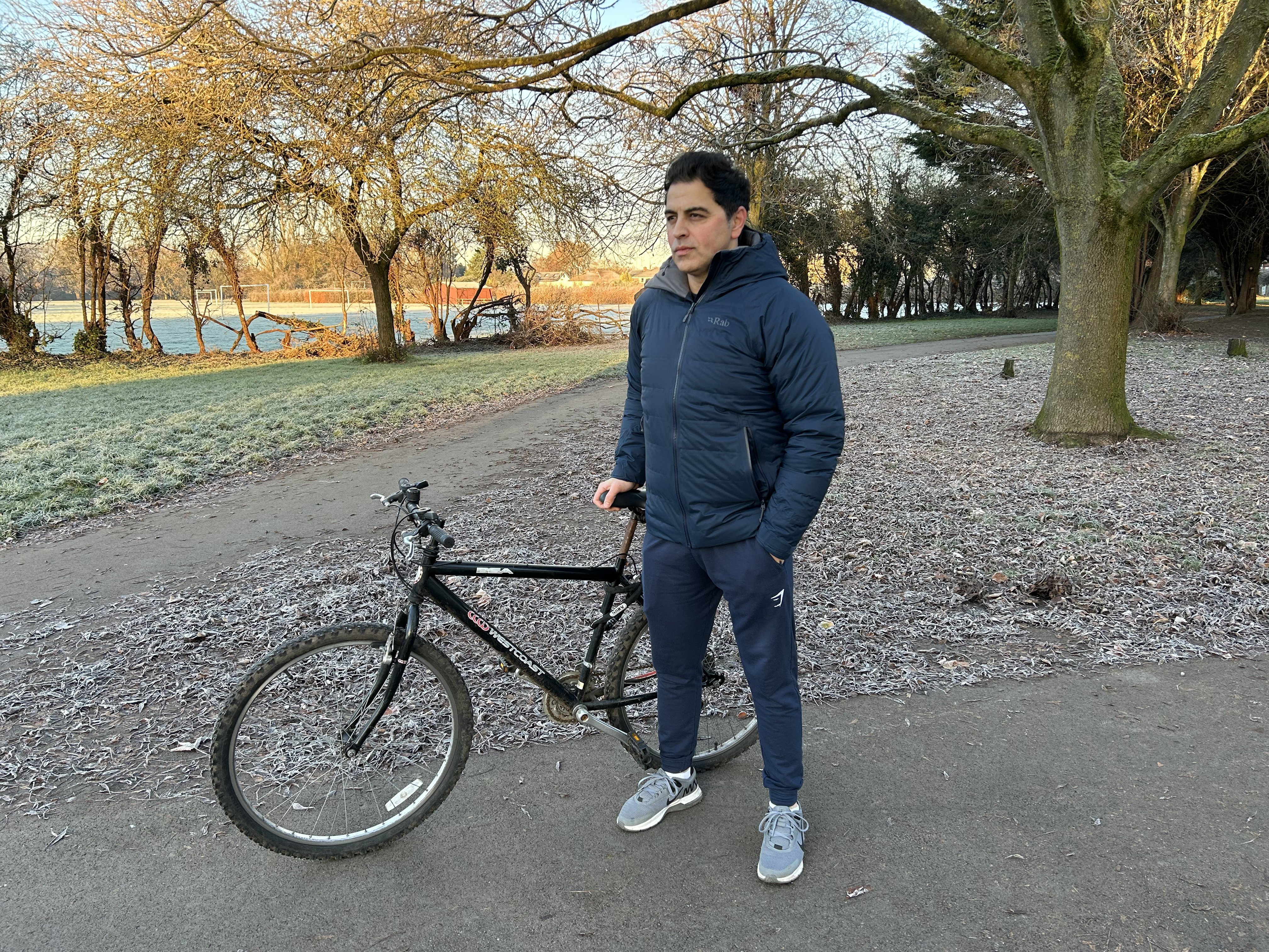 Waheed cycling to a local park for his daily exercise on a freezing winter morning-1702407031