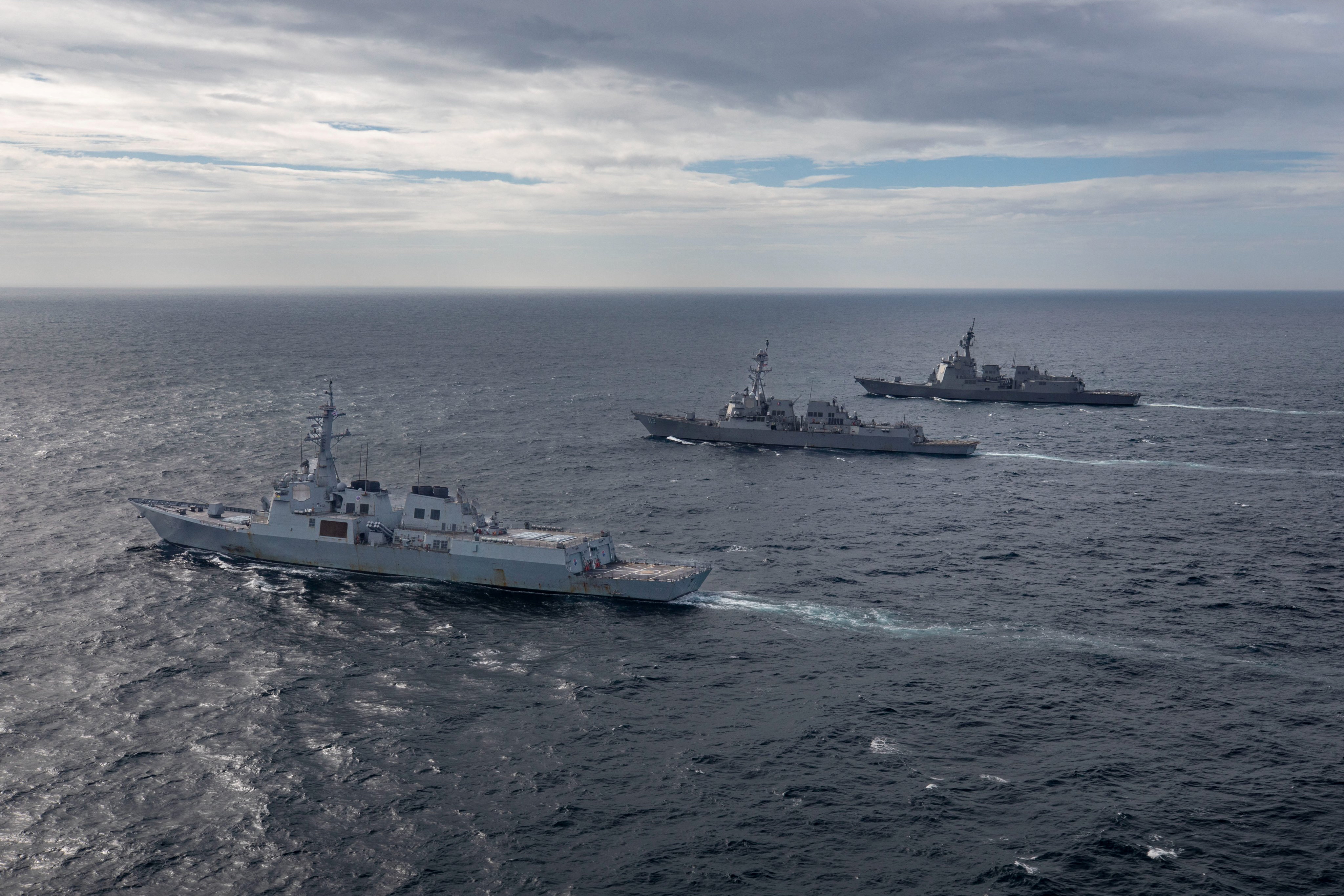 South Korean and Japanese naval ships conduct missile defense drill with US Navy in the Sea of Japan July 16, 2023. [Samantha Oblander/US Navy/Handout via Reuters]