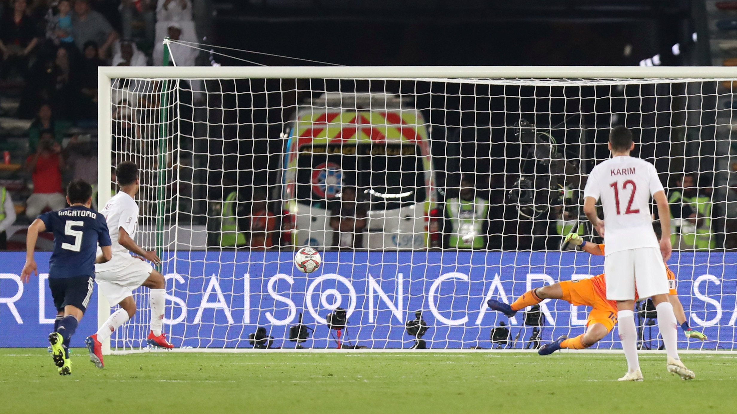 Qatar’s Akram Afif scores their third goal from the penalty spot in the 3-1 win against Japan in the 2019 final