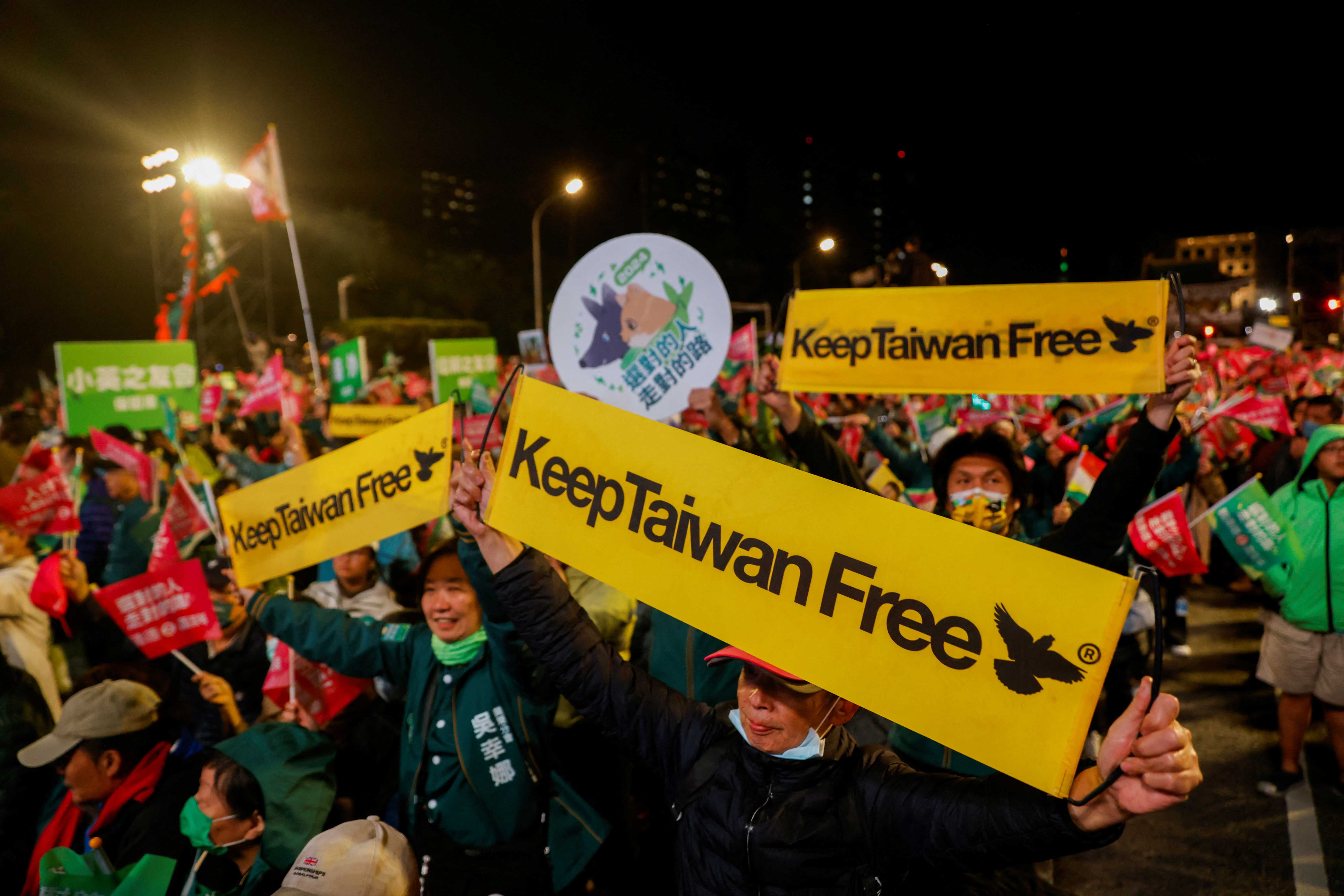Supporters attend a campaign rally of the ruling Democratic Progressive Party (DPP) ahead of the presidential and parliamentary elections in Taipei