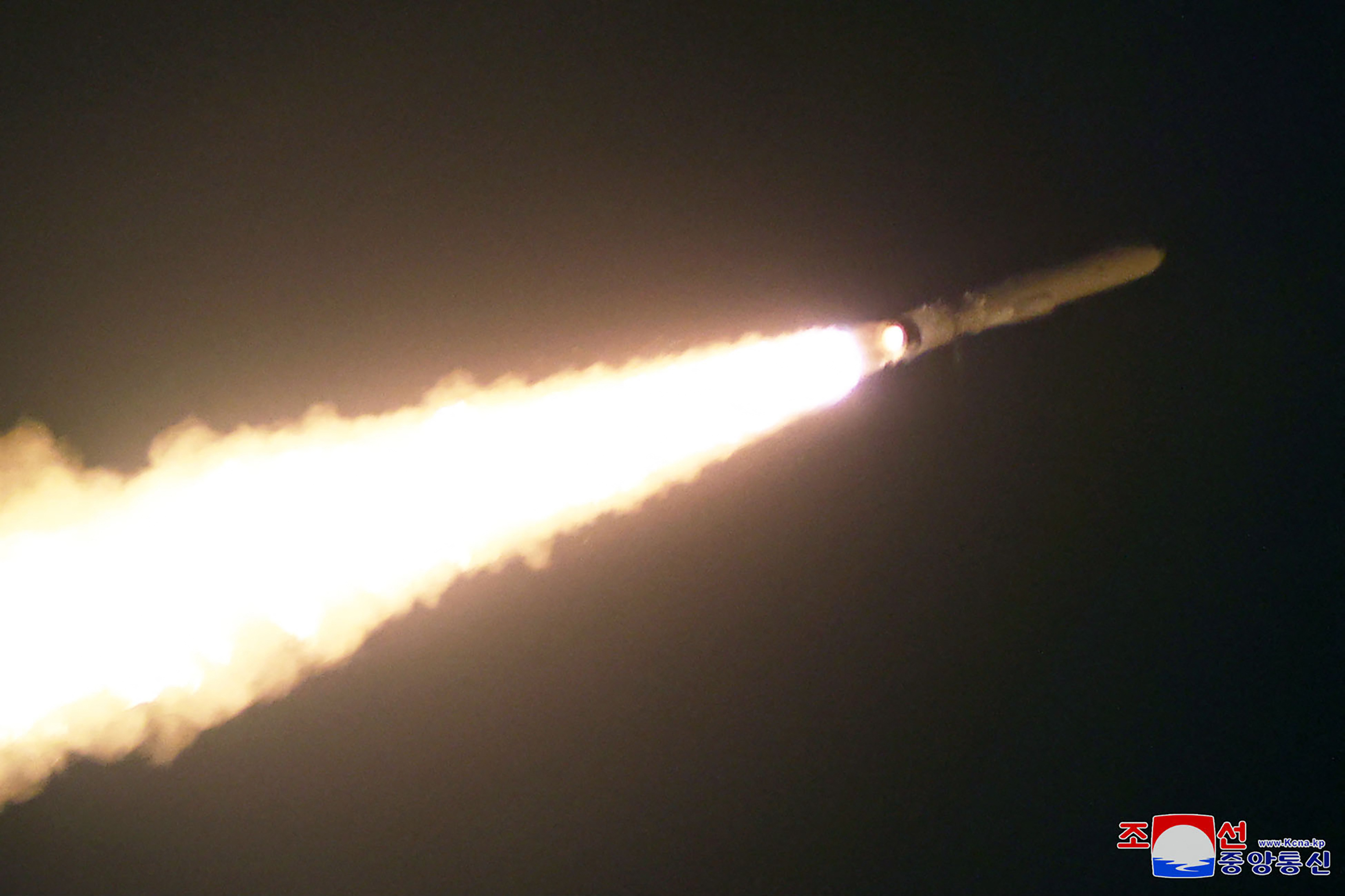 North Korea's 'new generation' cruise missile in flight. It is leaving a trail of flame and smoke