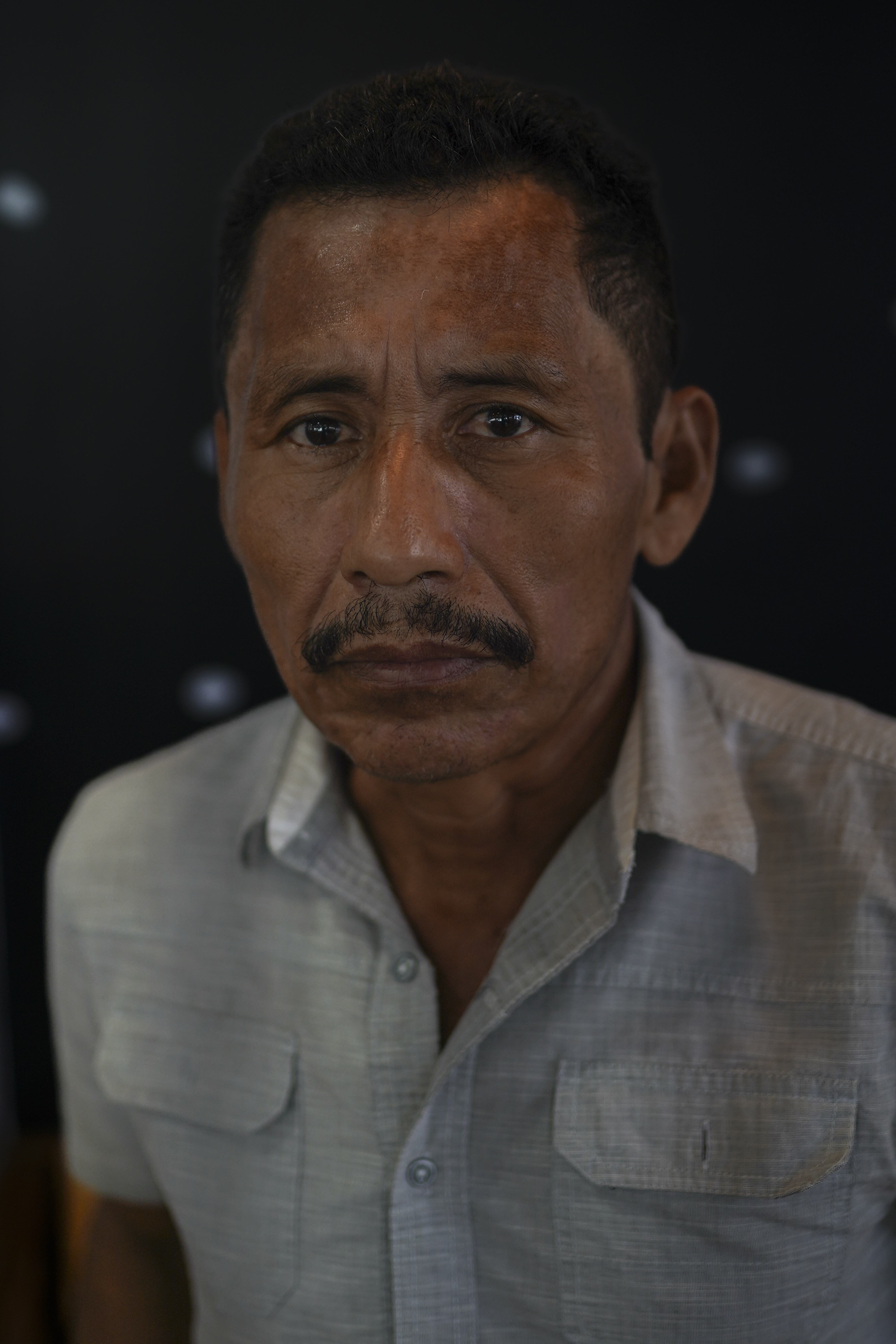 Santos Arevalo, 53, poses for a portrait on January 18 in San Salvador, El Salvador