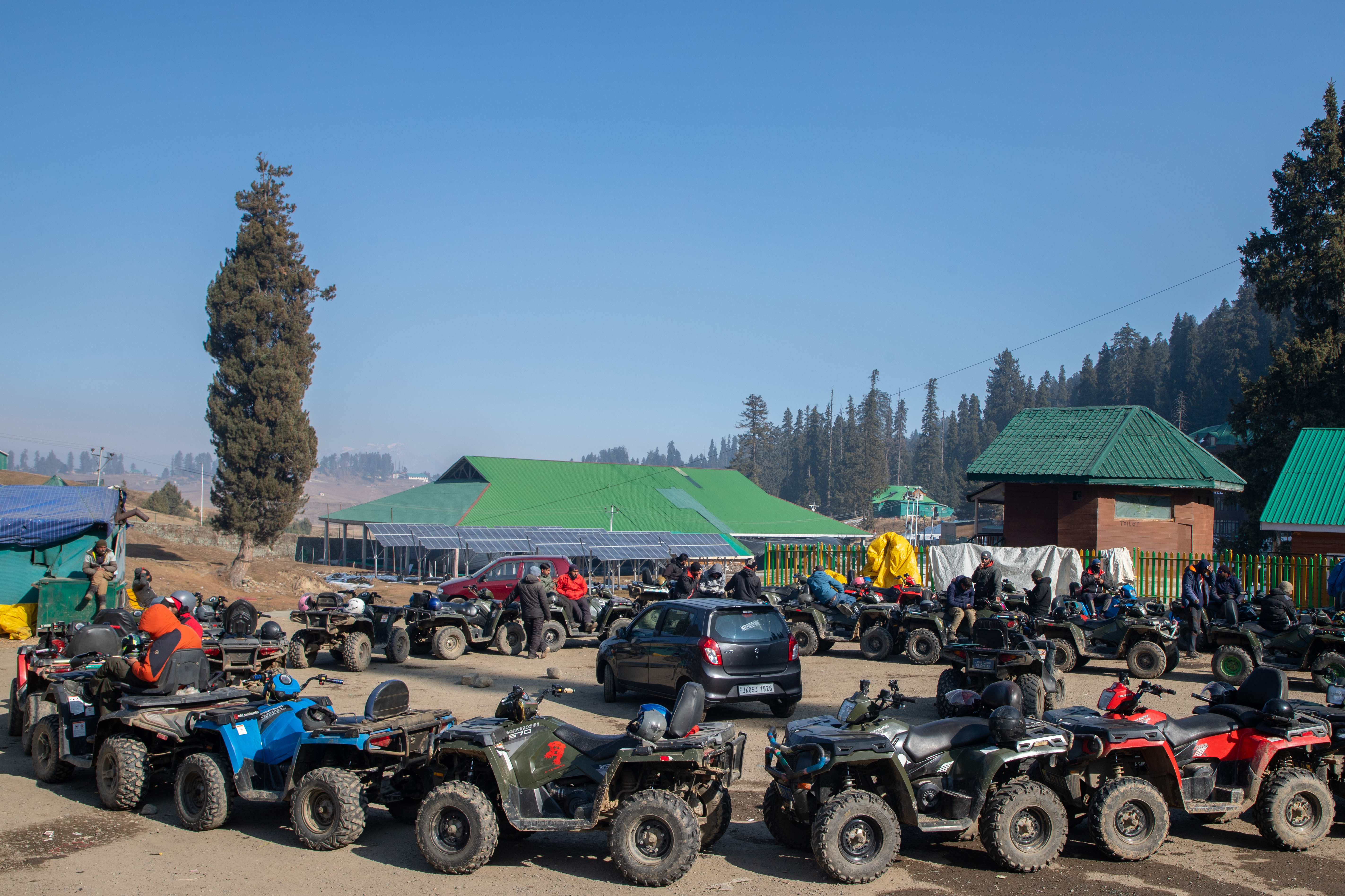 The ATVs and snow bikes parked in their stand in Gulmarg
