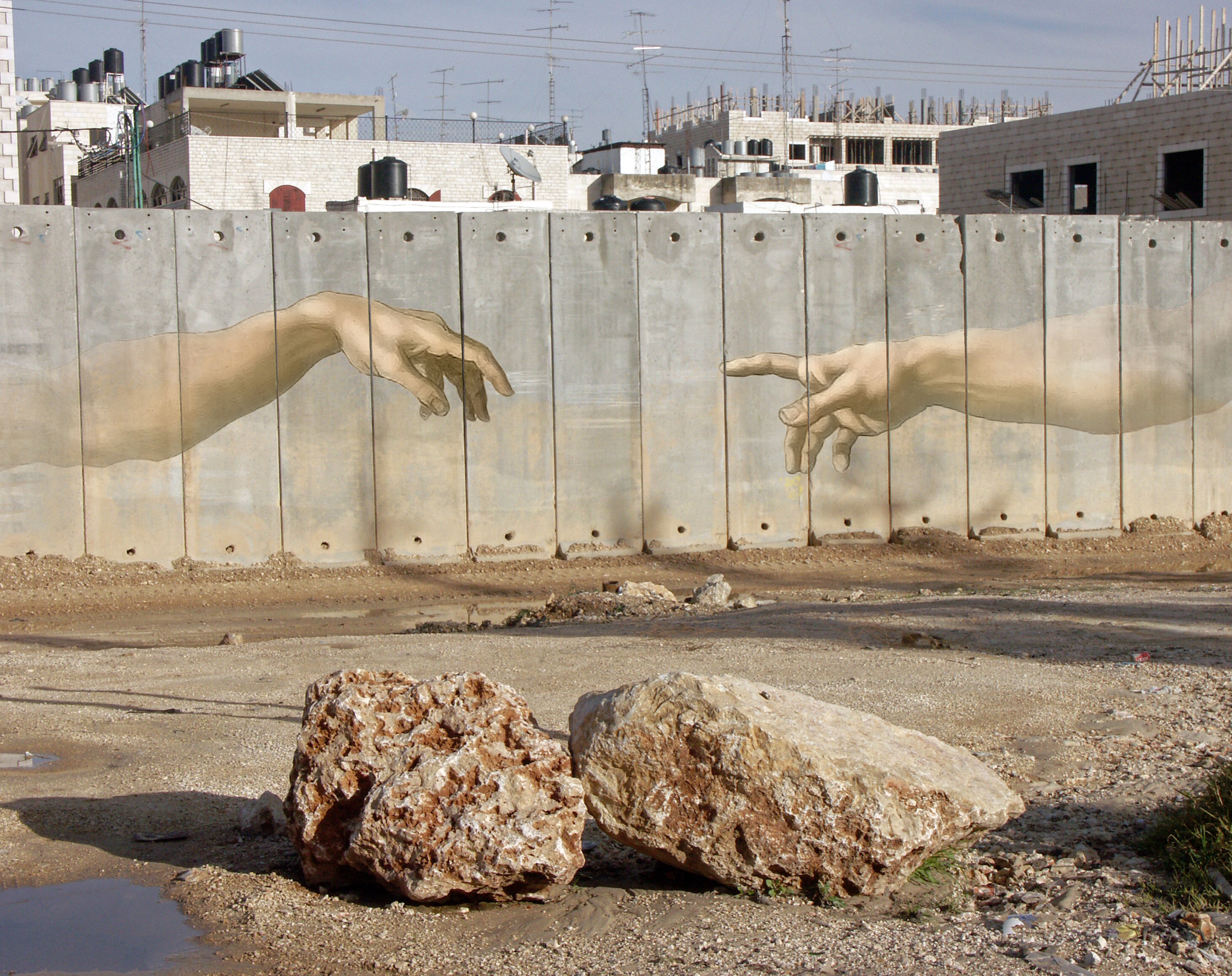 Three Cities Against the Wall, an exhibition that protested the separation wall construction by Israel in the occupied territories of Palestine, was held simultaneously in Ramallah, Tel Aviv and New York City in November 2005. Mansour helped to organise the event in Palestine [Courtesy of Sliman Mansour]