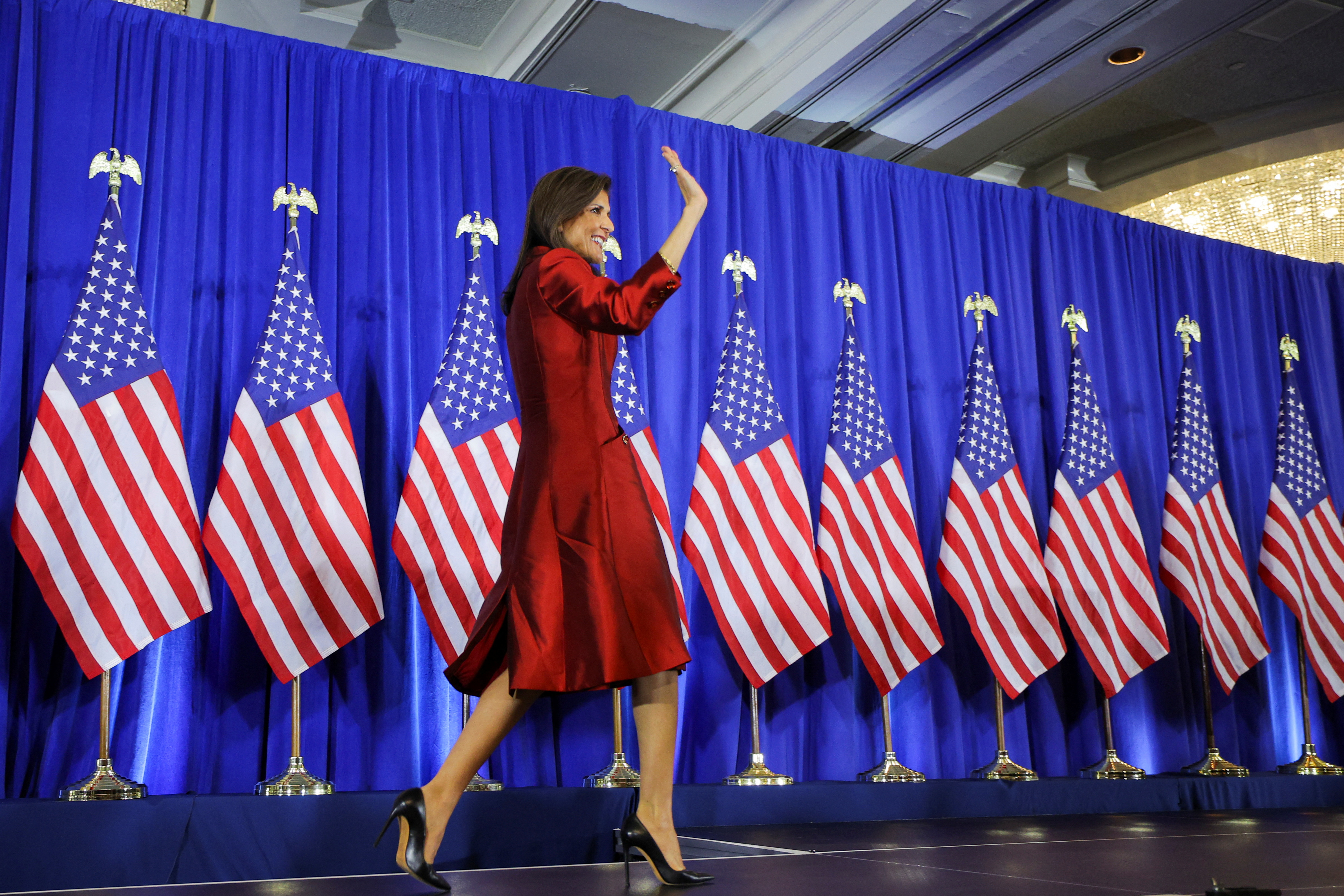 Republican presidential candidate Nikki Haley walks on stage after the South Carolina Republican primary in Charleston, South Carolina, on February 24