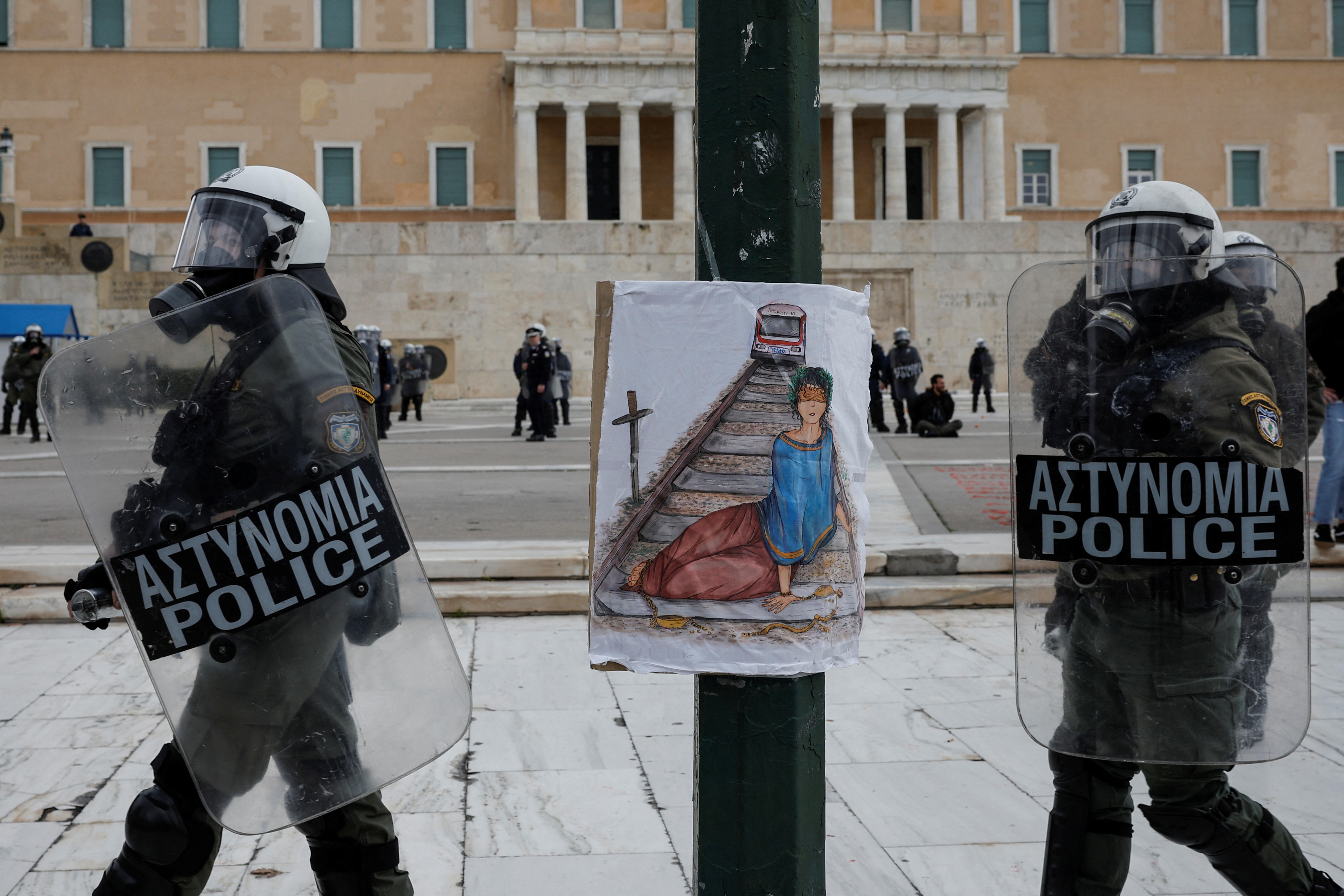 Greece's unions calls one-day strike to mark train crash anniversary and demanding pay rises