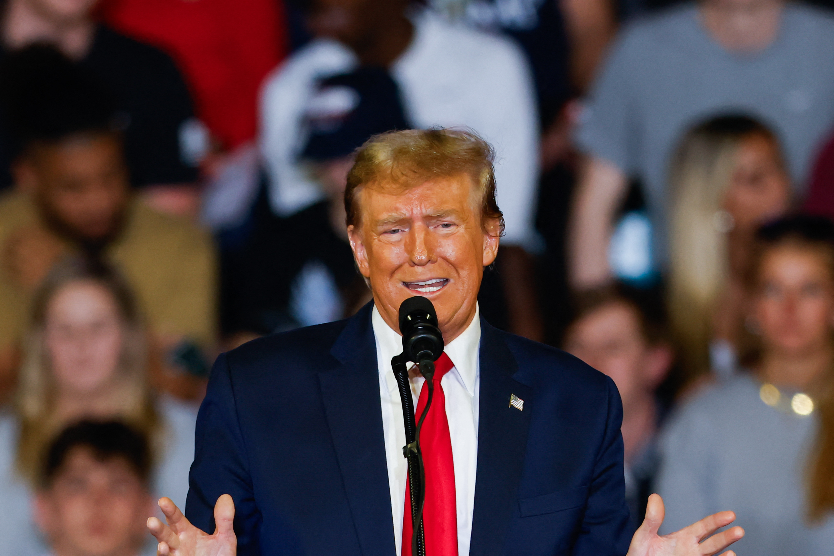 a man with a red tie and orange face
