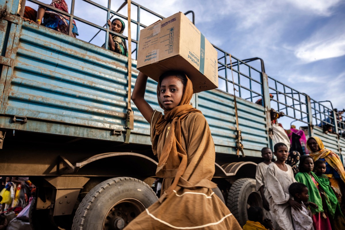 A Sudanese girl who fled the war pictured in a refugee camp in Renk, South Sudan