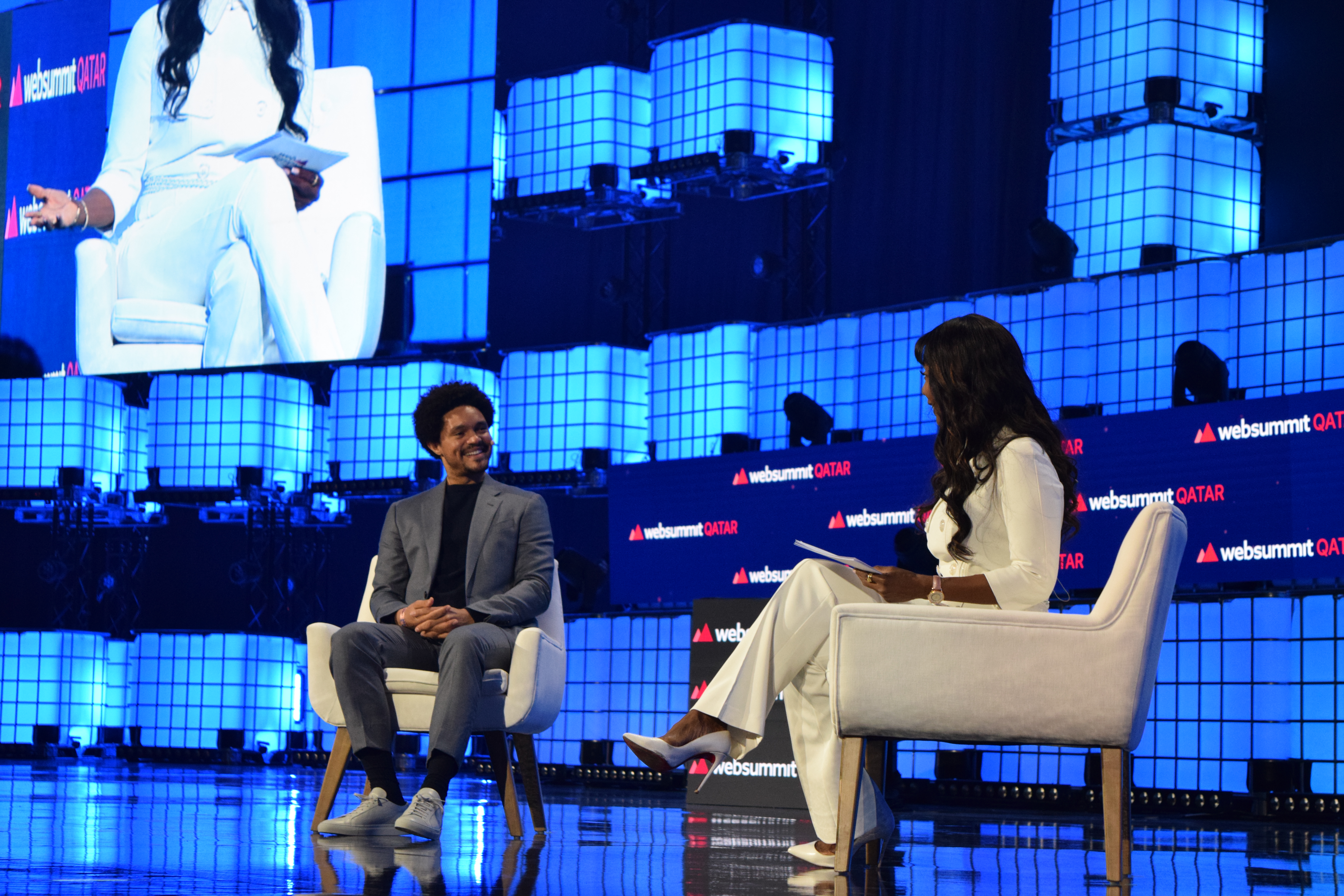 Trevor Noah speaking at at Web Summit in Doha, Qatar