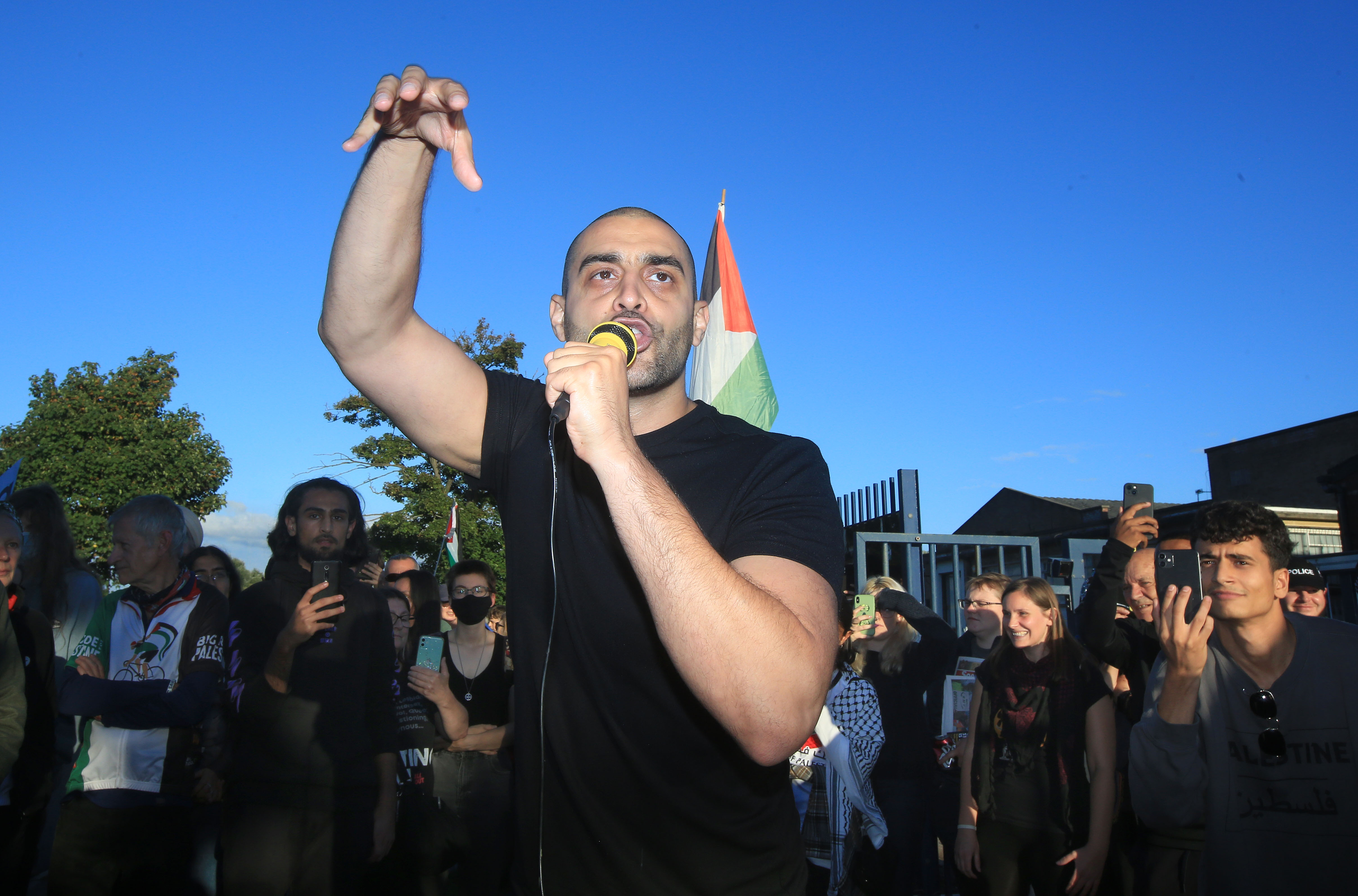 Rapper Lowkey (Kareem Dennis) performs outside UAV Engines in protest at the drones produced here for Israeli military manufacturer Elbit Systems and used in Gaza and elsewhere, on September 10, 2022, in Shenstone, UK. Lowkey released his own track in solidarity with Gaza