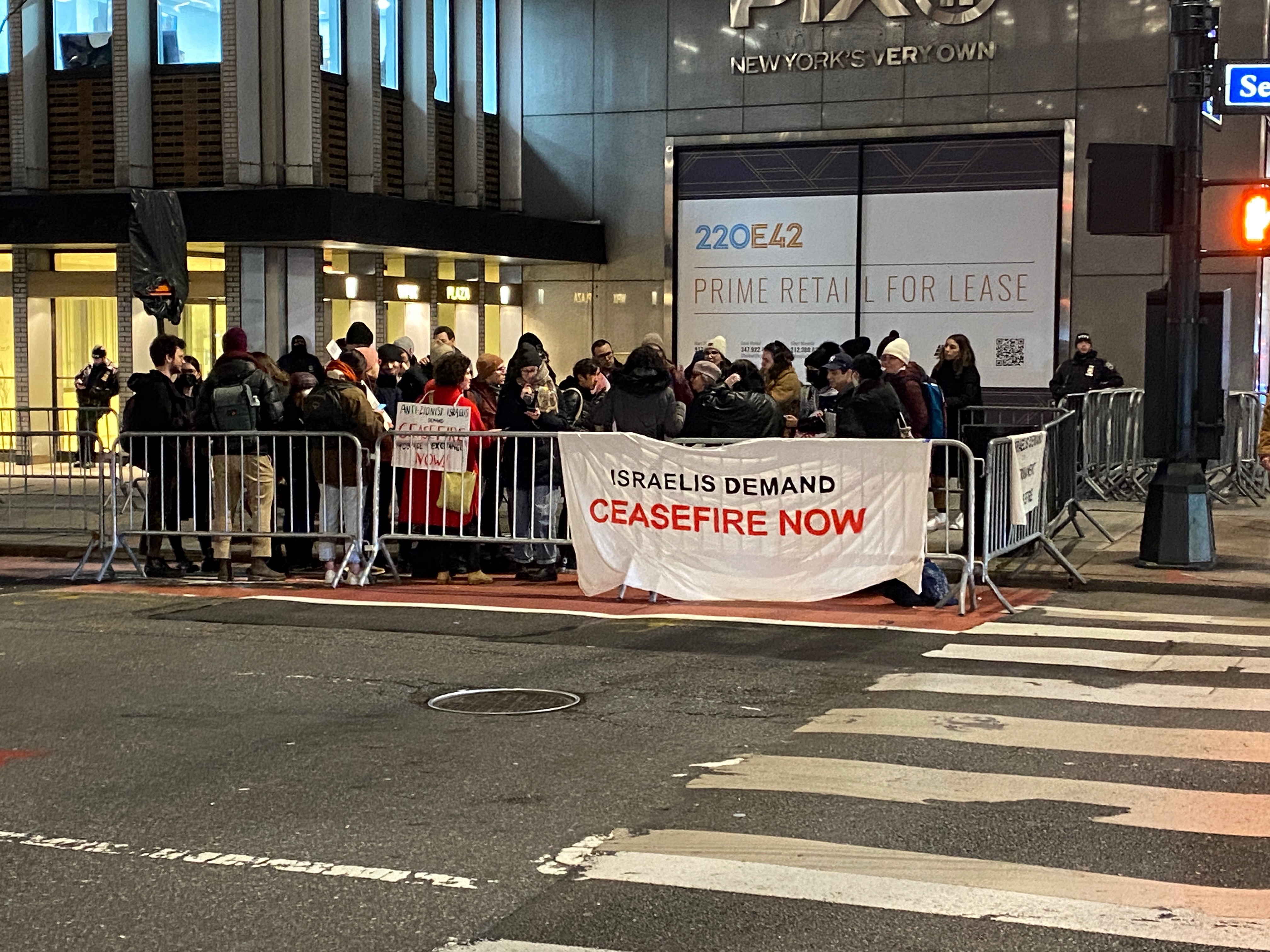 Israeli protesters gather on a sidewalk in New York City to denounce the ongoing military campaign in Gaza