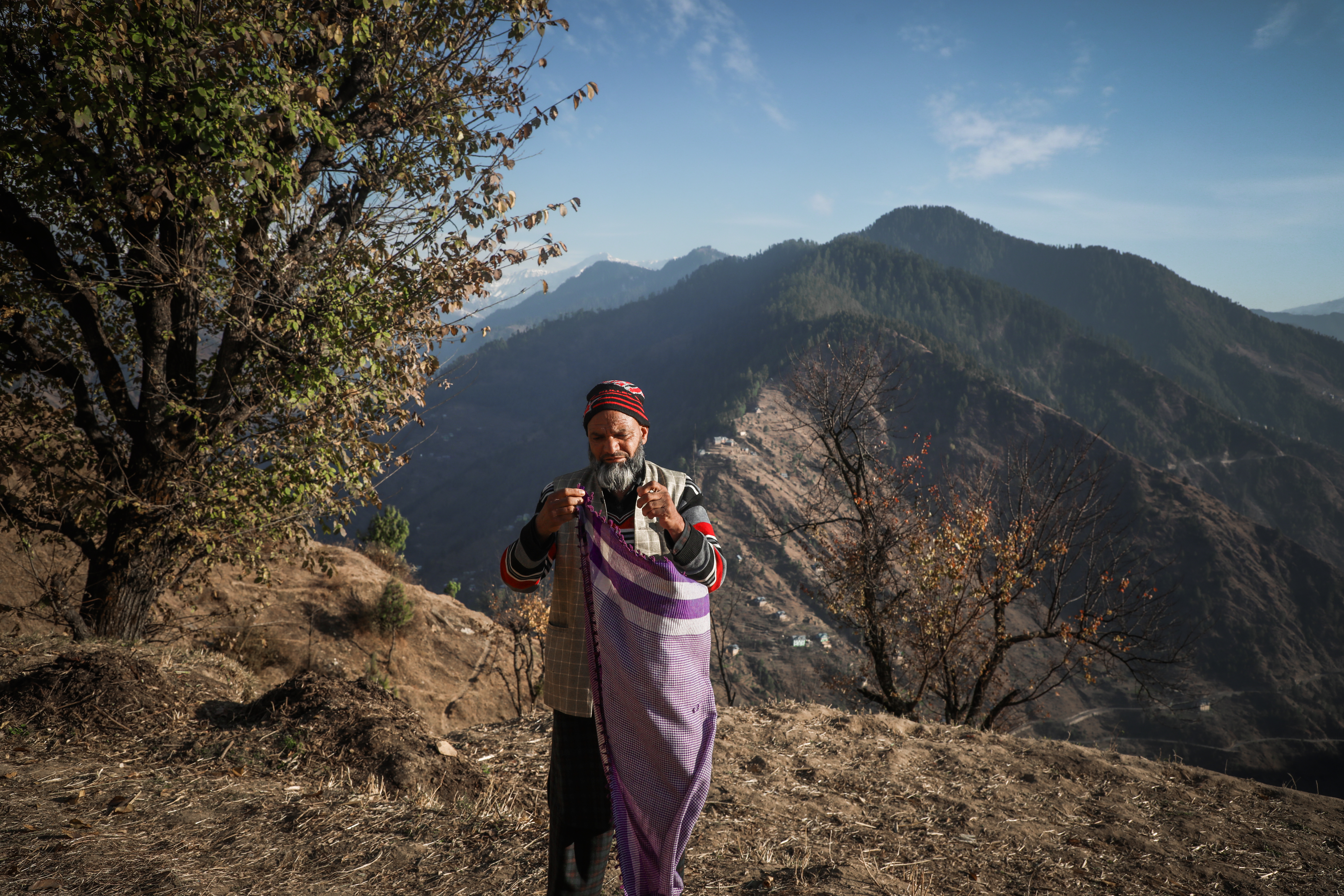 Bashir Ahmed, 50, has three daughters who are deaf-mute. He laments the lack of a school they might have attended