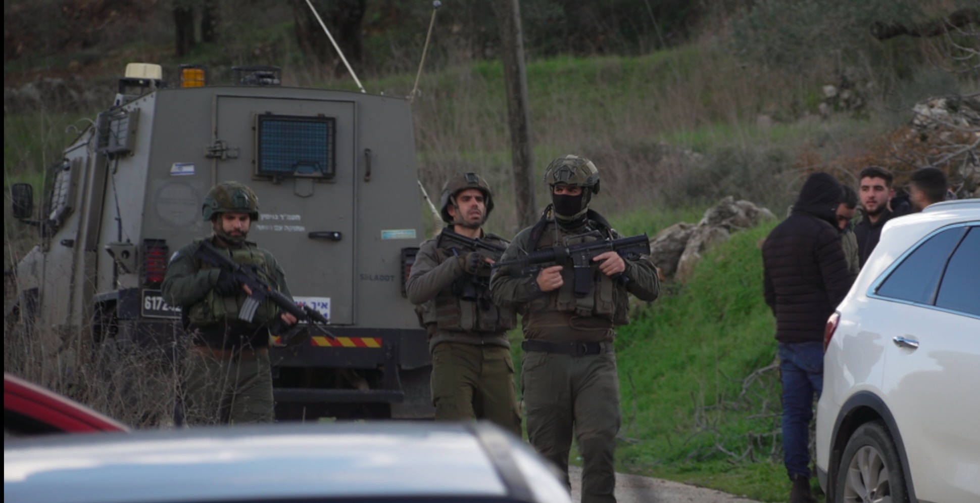 Soldiers arrive in the Palestinian village of al-Sawiya after a settler attack there the night before