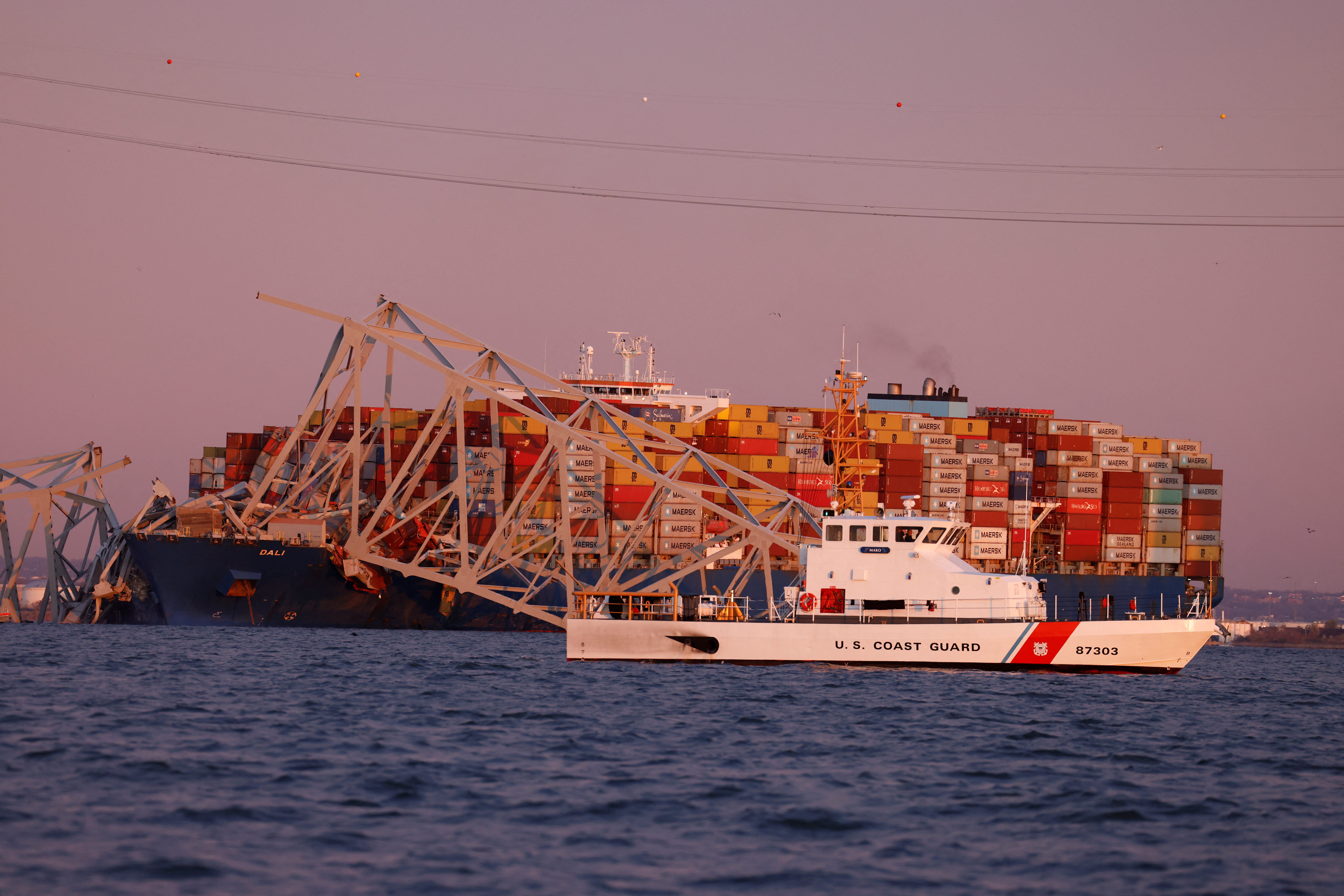 Major US bridge collapses as cargo ship plows into pylon