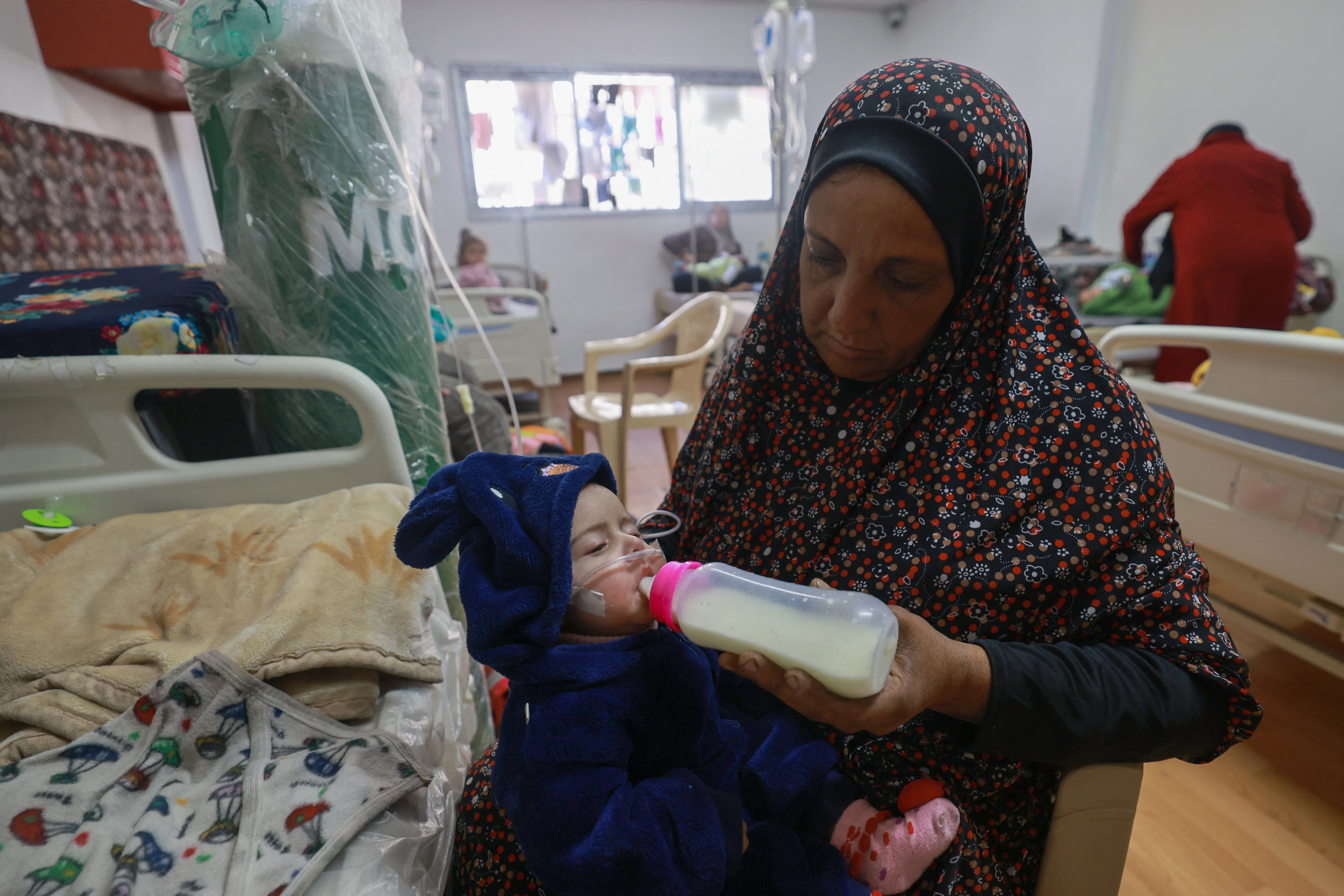 Palestinian children suffering from malnutrition receive treatment in Rafah, Gaza Strip on March 5, 2024. [Mohammed Abed/AFP]