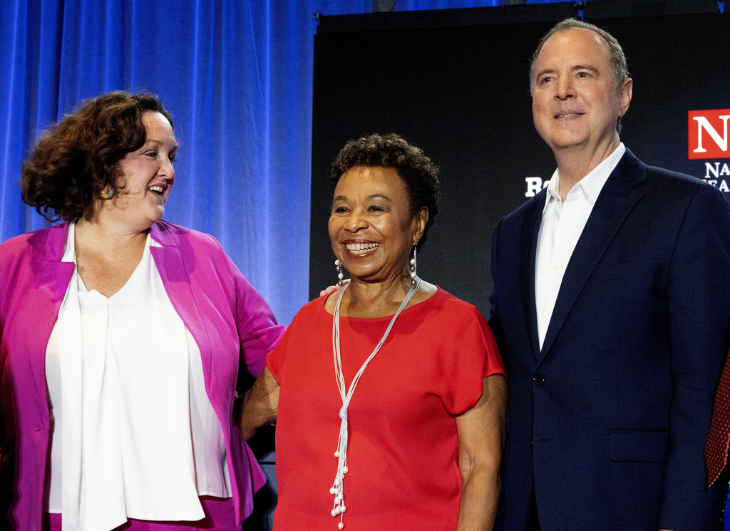 Democratic Senate rivals Katie Porter, Barbara Lee and Adam Schiff pose for photos after a US Senate Candidate Forum in Los Angeles in October 2023
