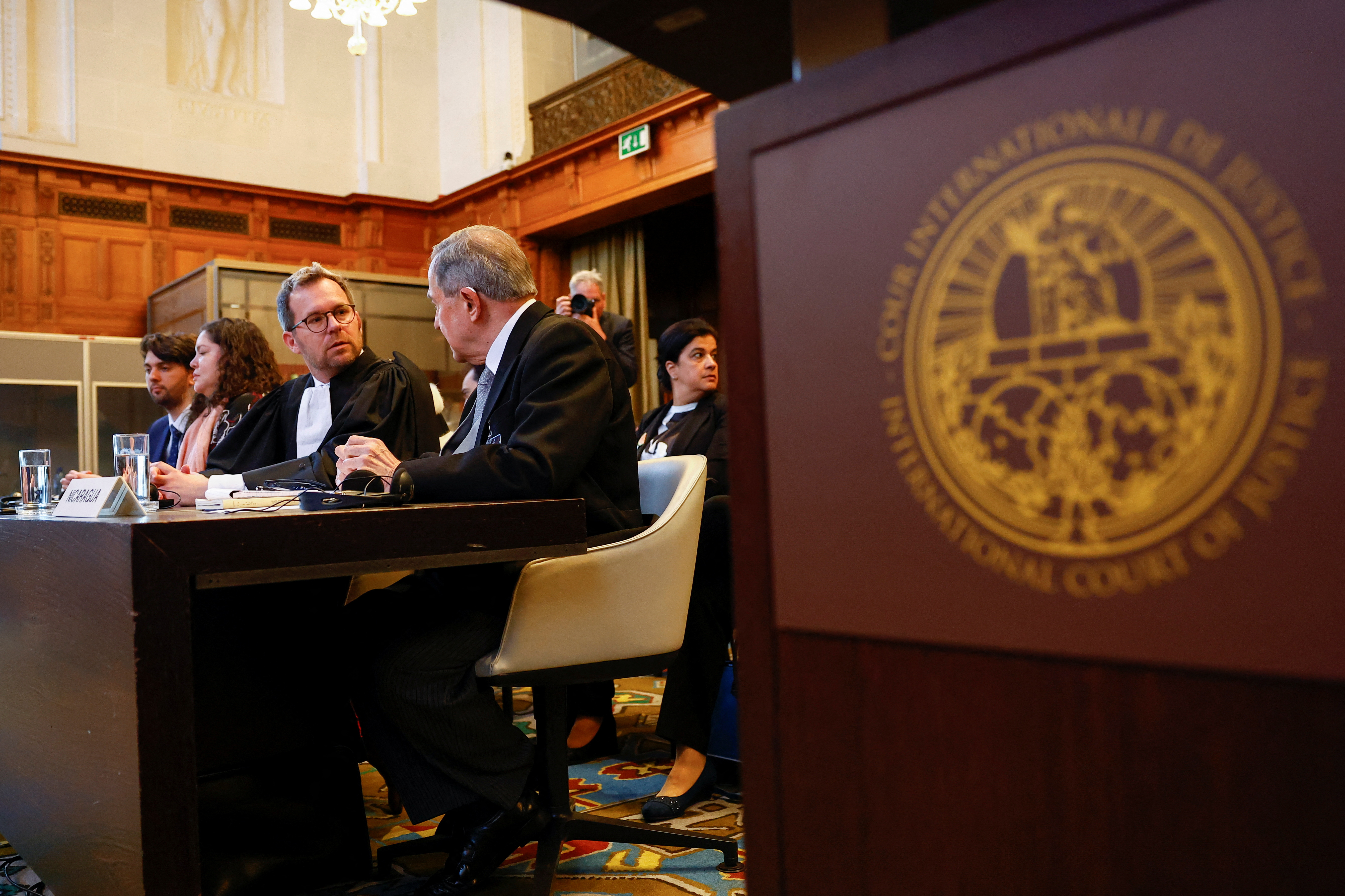 Nicaraguan Ambassador to the Netherlands Carlos Jose Arguello Gomez and lawyer Alain Pellet attend court on the day the International Court of Justice (ICJ) will rule on a demand from Nicaragua to order Germany to halt military arms exports to Israel and reverse its decision to stop funding U.N. Palestinian refugee agency UNRWA, at The Hague, Netherlands, April 30, 2024. REUTERS/Piroschka van de Wouw