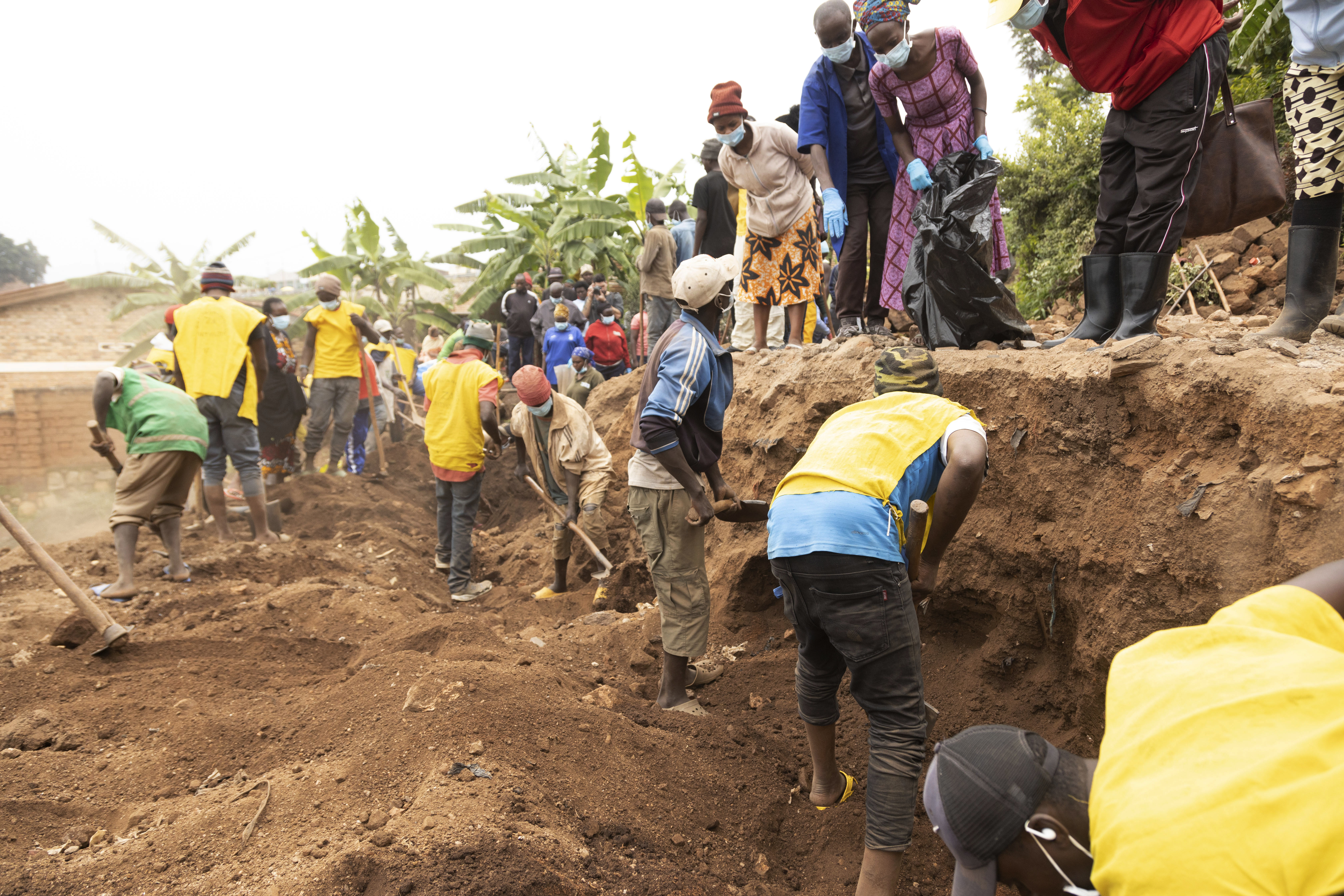 Remains of the genocide victims being retrieved from a site in Huye District, southern Rwanda