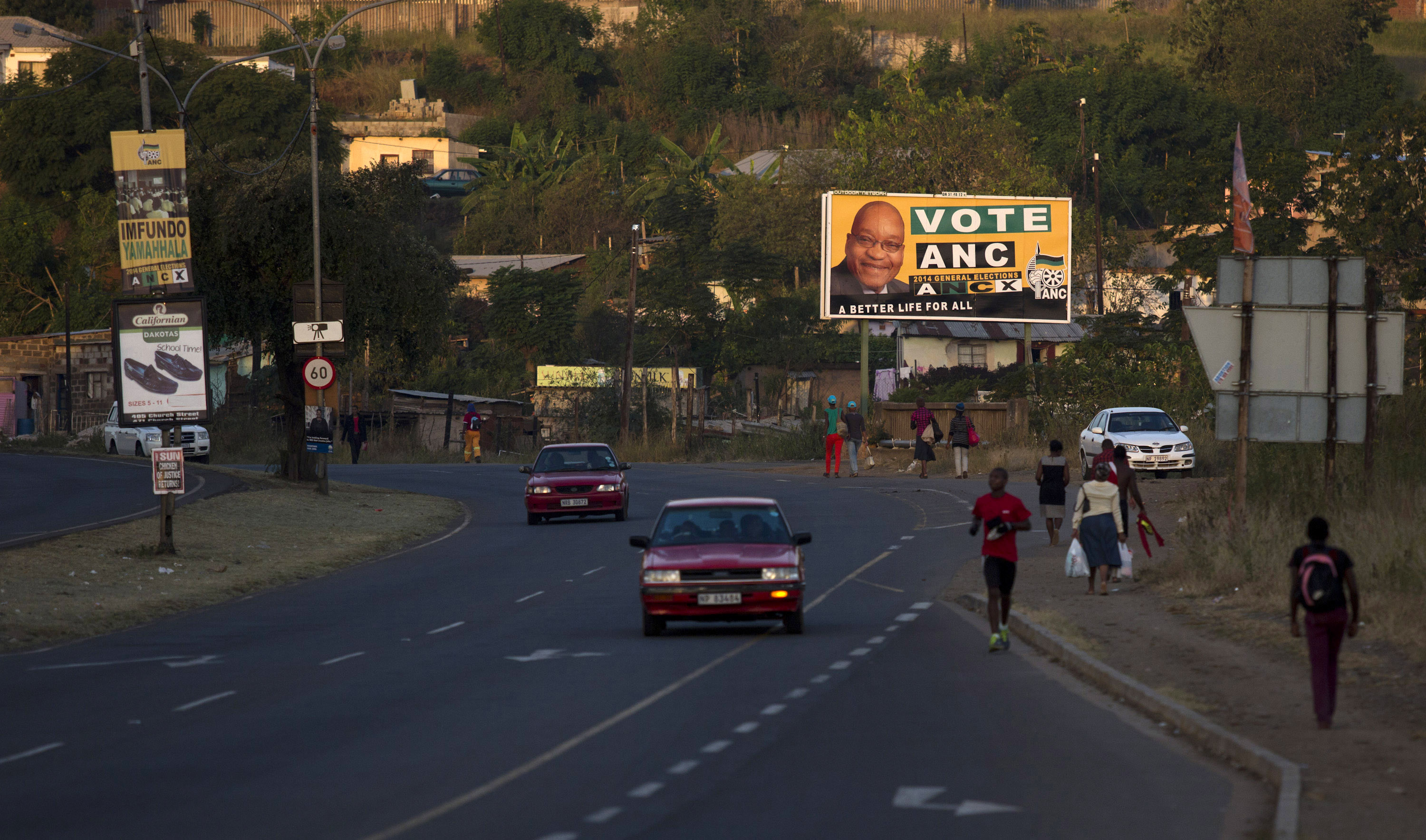 In a picture taken before the 2014 elections, then-President Zuma appears on an ANC billboard in KZN