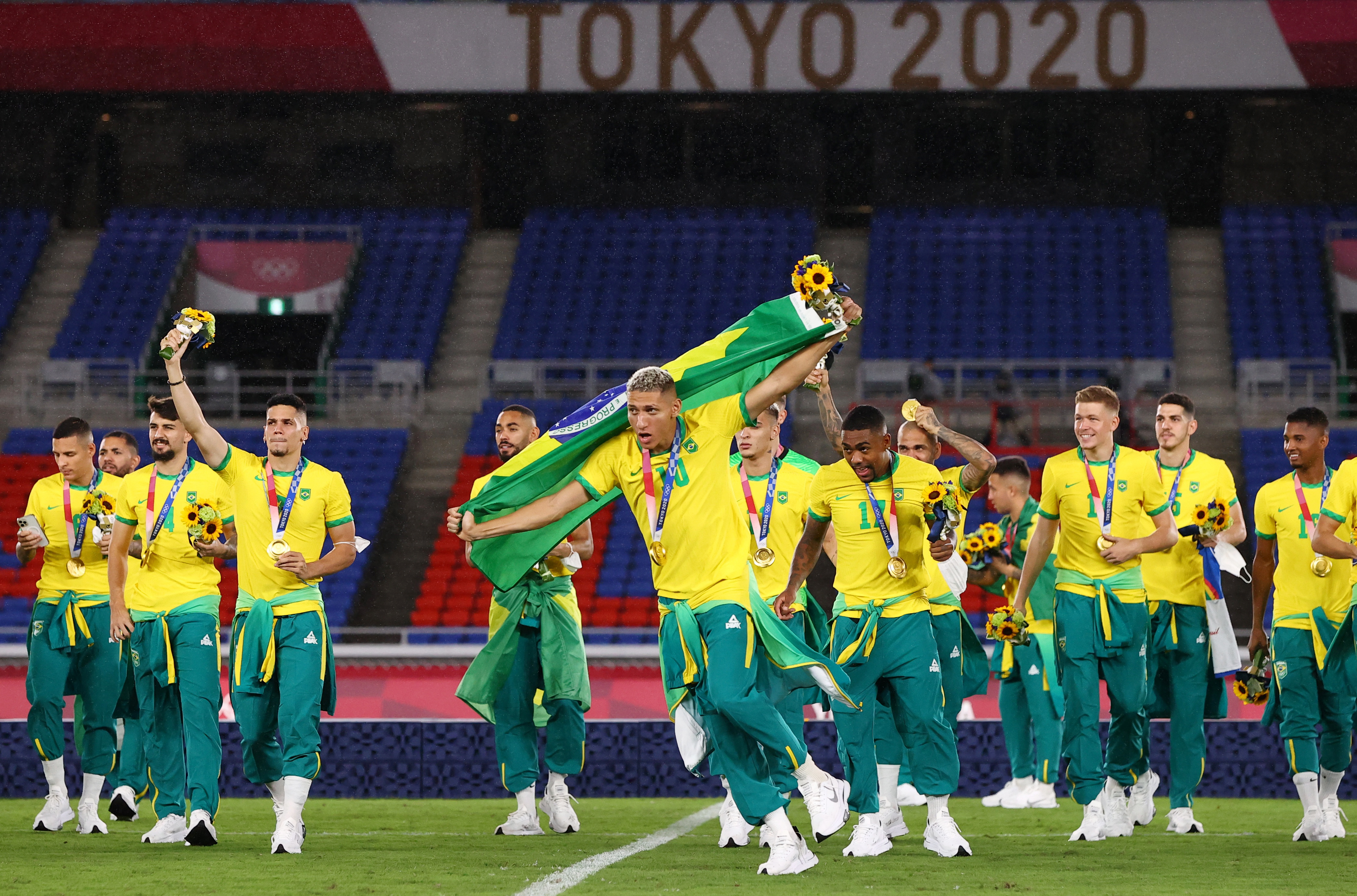 Brazil players celebrate their gold medal achievement at the Tokyo 2020 Games. The Brazilians will not be playing in Paris this year after failing to qualify