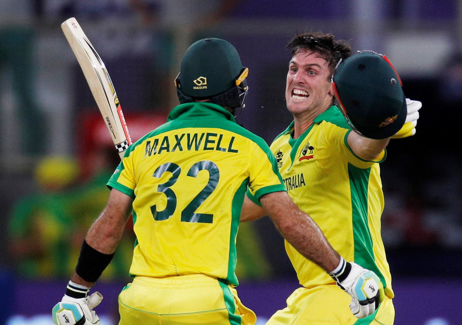 Australia’s Mitchell Marsh, who will captain the side at the 2024 edition, and Glenn Maxwell celebrate winning the 2021 Men’s T20 World Cup