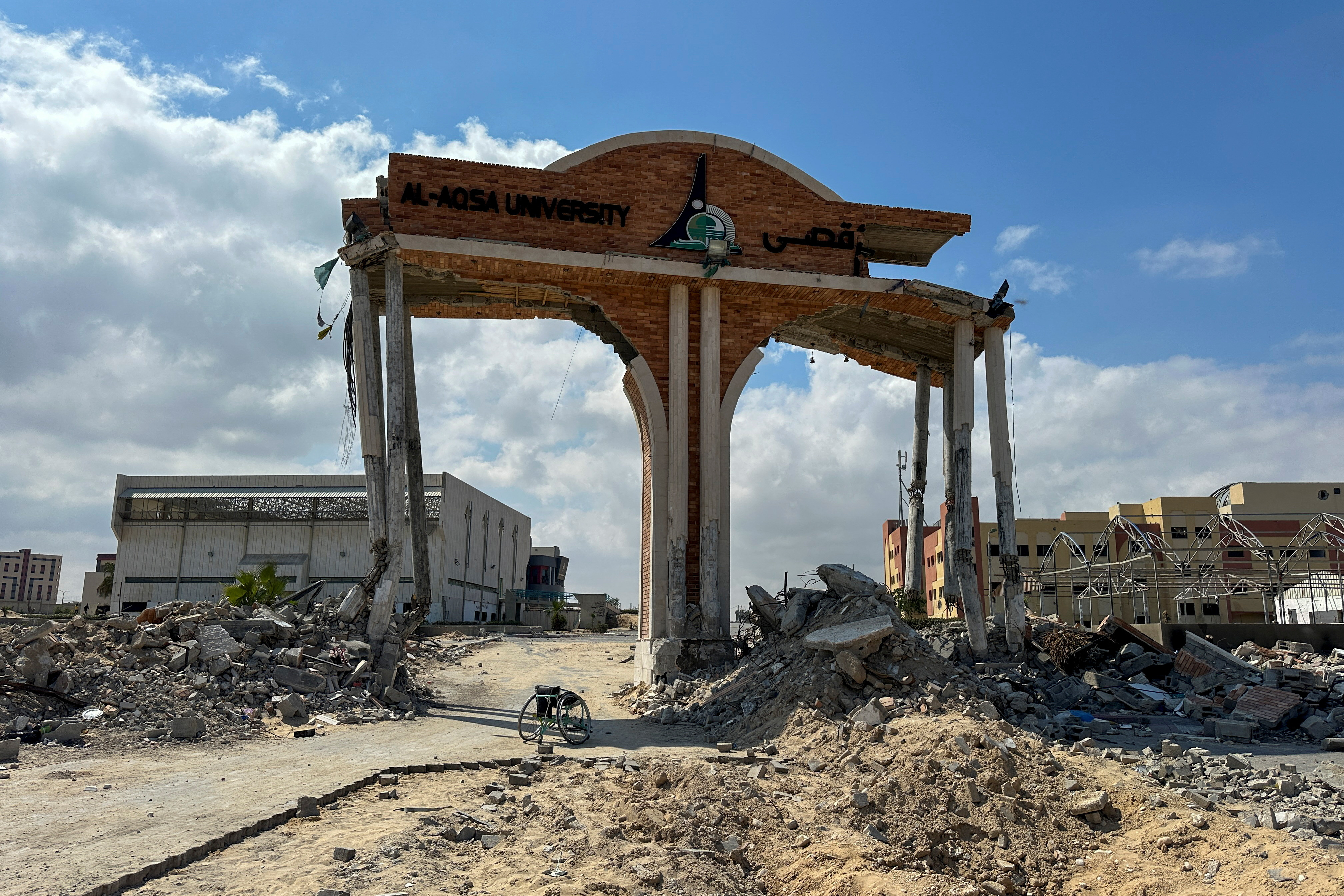 A damaged gate of Al-Aqsa university, which was destroyed during Israel's military offensive, stands in Khan Younis in the southern Gaza Strip April 14, 2024. REUTERS/Doaa Rouqa